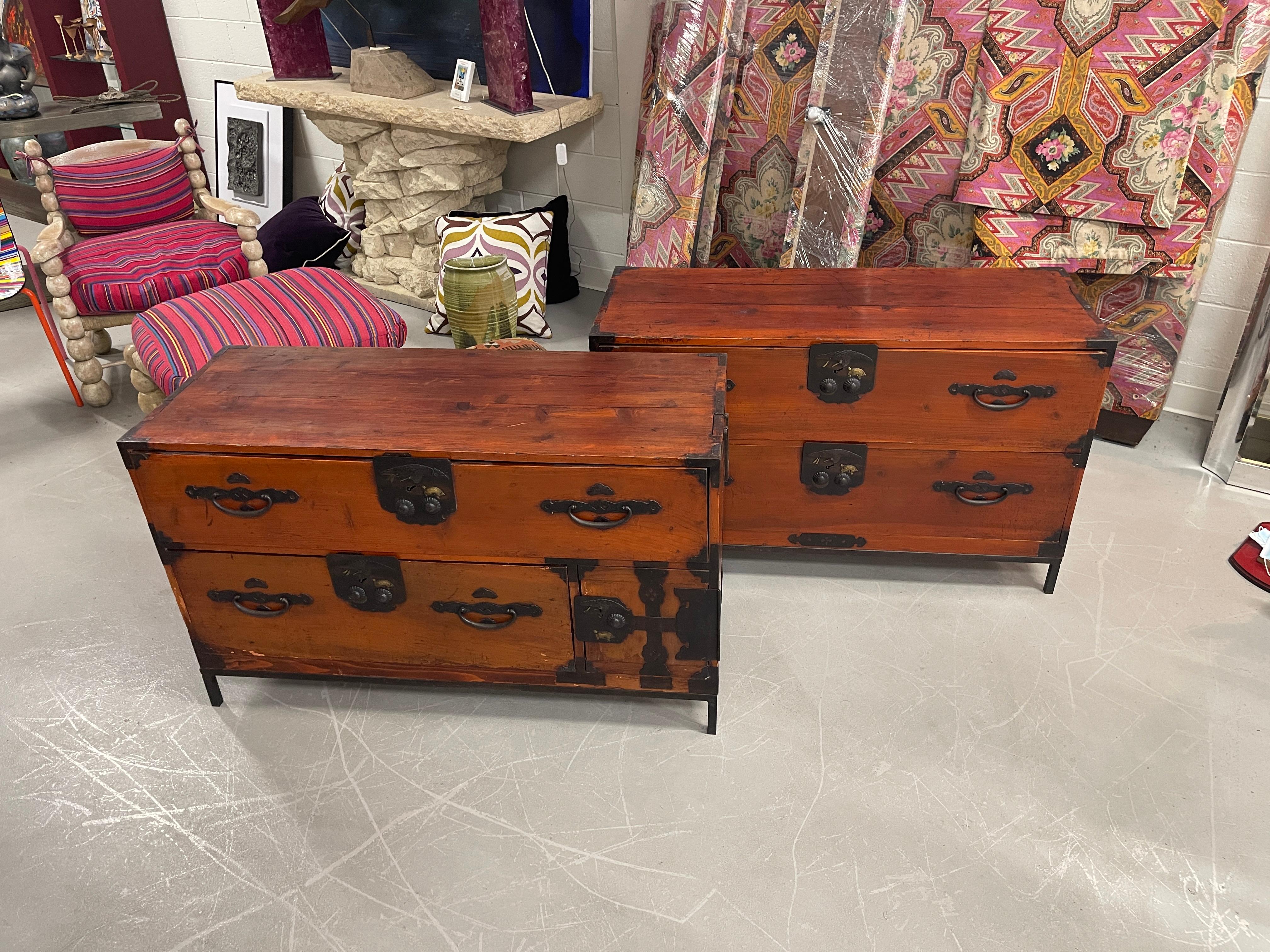Beautiful pair of Japanese Tansu chests. These are out of a great Palm Springs estate. These are old Meiji period chests that have been refitted with new interiors and frames in the 1980's. The hardware is wonderful and period. In good overall
