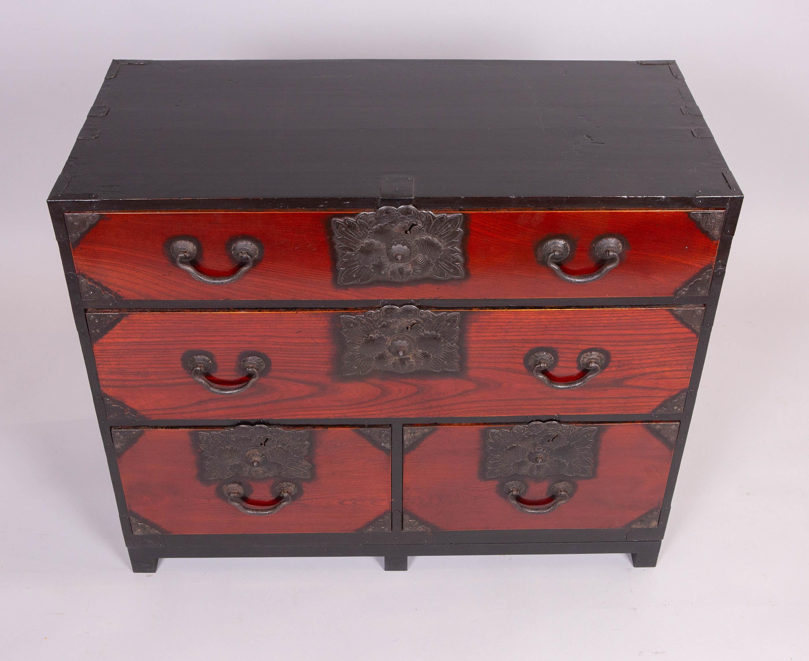 With keyaki wood drawers (a treasured wood in Japan), early hardware, ebonized top and sides.  Comes on a 3
