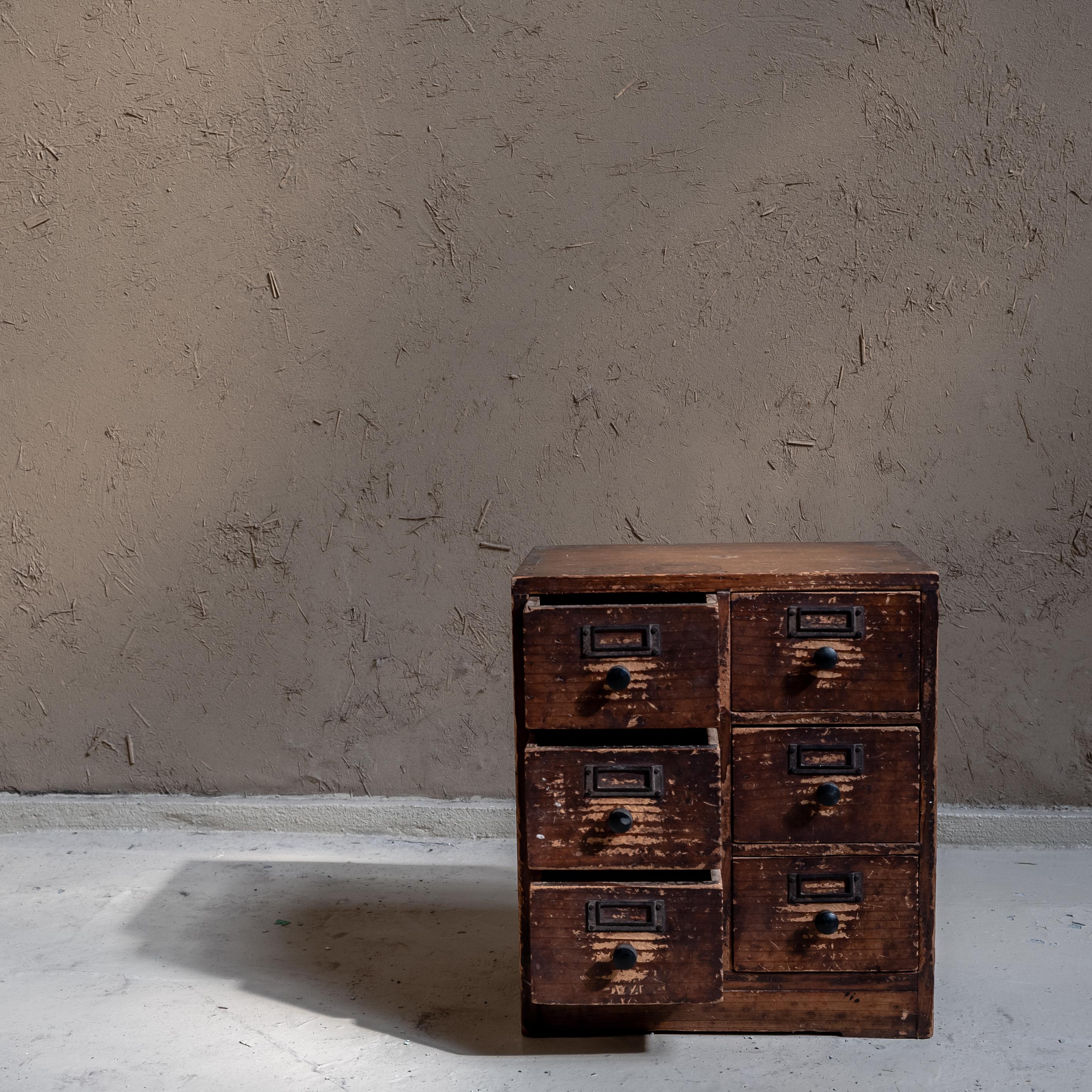 The unique antique tansu — an elegant piece of furniture with deep Japanese roots. 
This small tansu features six compartments that are not only functional but also serve as a work of art, reflecting the refined style of Japanese design. Each