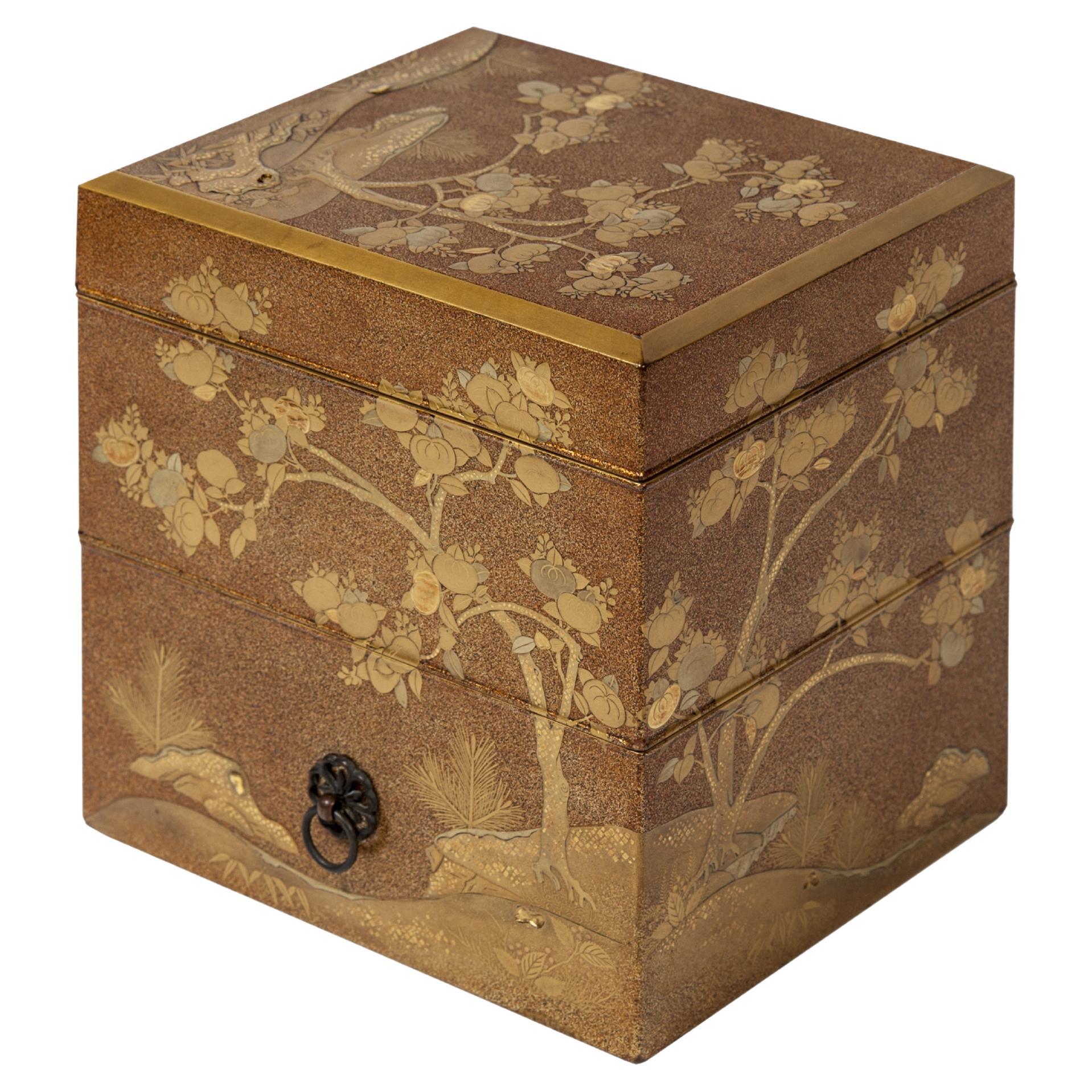 Japanese Tebako in Nashiji lacquer adorned with golden Persimon flowers