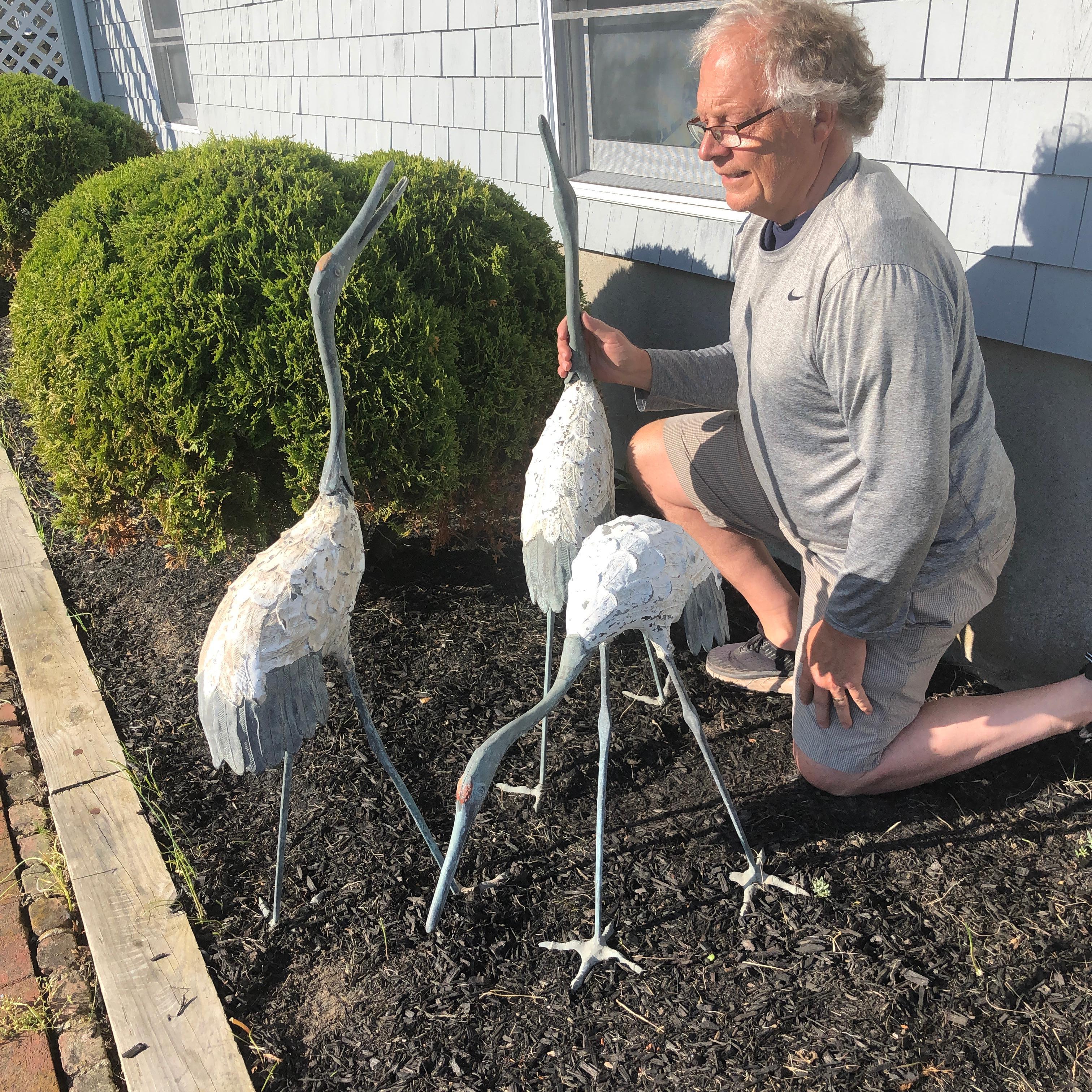 Fresh find from our recent Japanese Acquisitions

Our last complete set

Japan, a fine set of three tall and large scale hand caste bronze finely detailed red crested cranes. Attractive variegated green patina surfaces punctuated with old hand