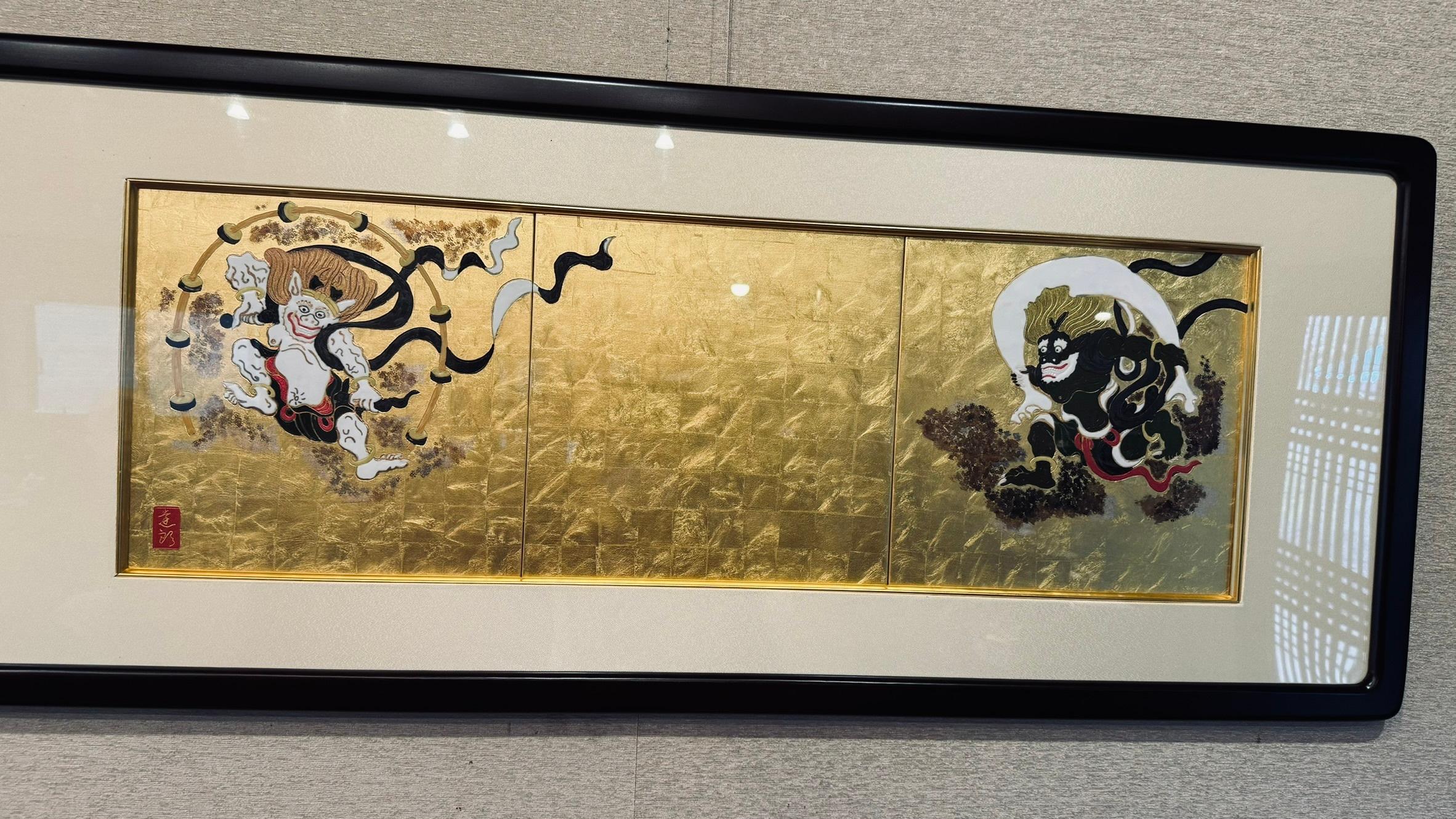 Extraordinary Japanese contemporary three-panel framed porcelain artwork in  gold, black and white. This is a masterpiece by a third generation master porcelain artist in the Imari-Arita region of Japan who is the descendant of an extended family of