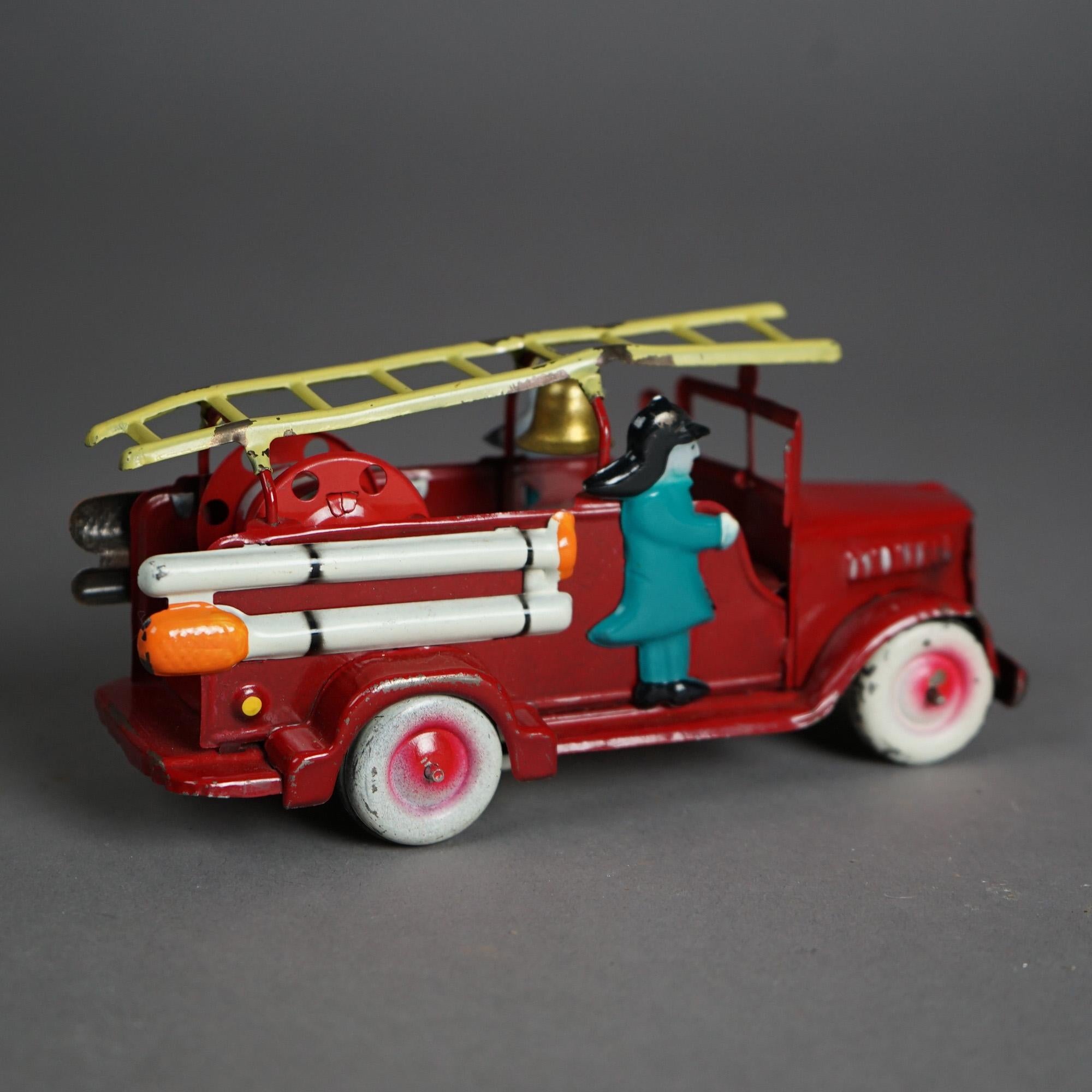 Japanese Tin Litho Toy Fire Engine In The Original Box by KAT, Circa 1950

Measures - 3