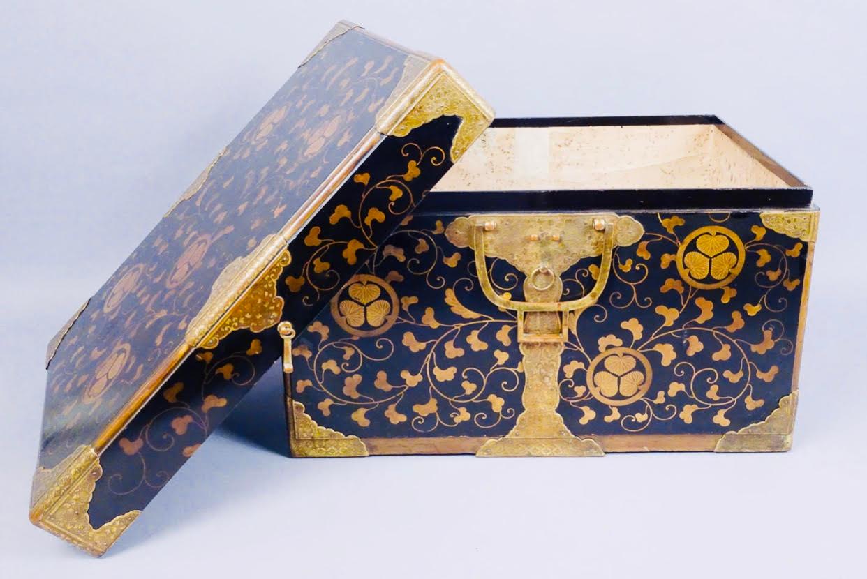 Japanese rare early fine beautiful Tokugawa gold and black Lacquered wedding chest. Featuring Tokugawa crest and wild ginger motif, with gold gilt bronze. fittings. Gilded mulberry paper in the interior of the chest

Possibly belonging to the