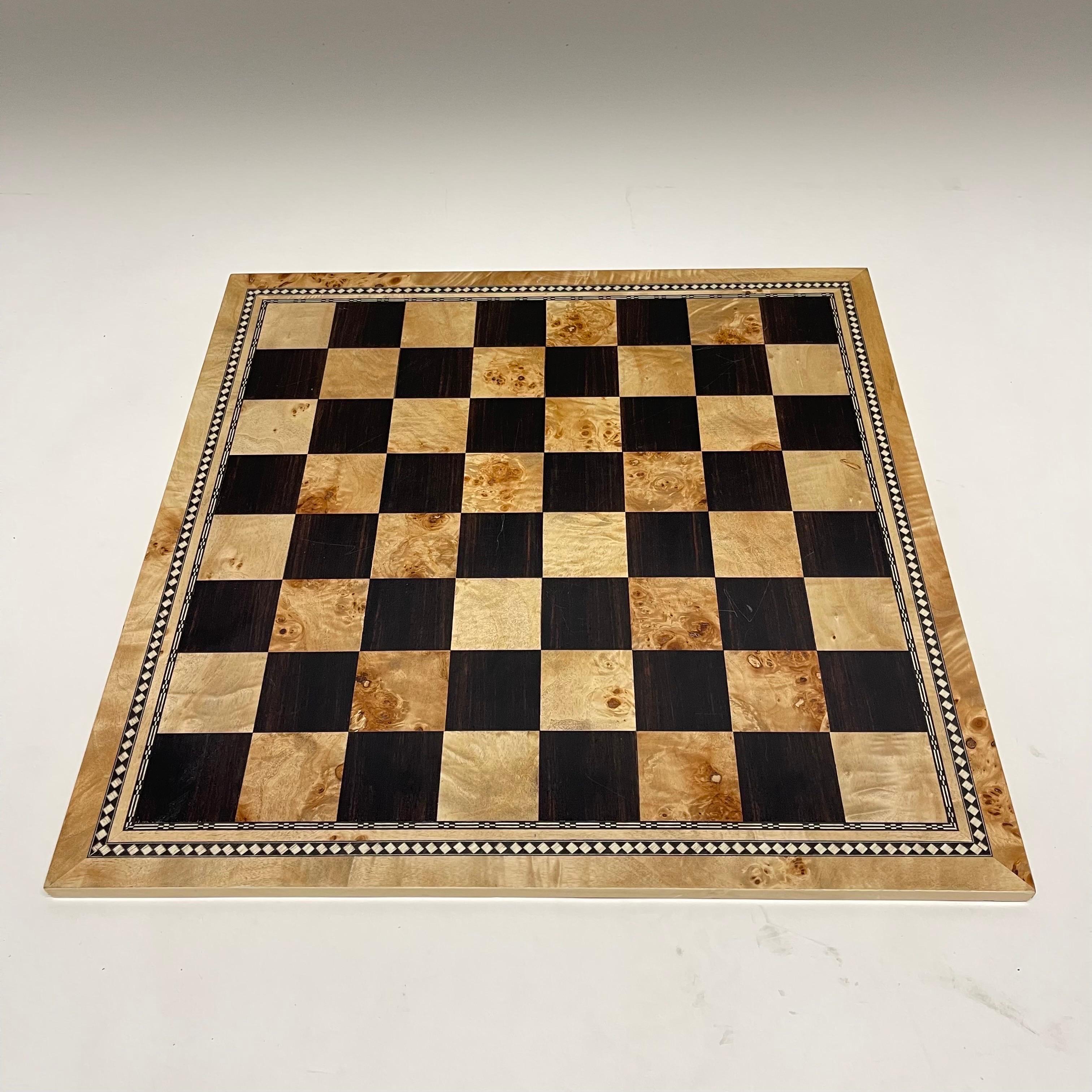 Post-Modern Japanese chessboard or checkerboard. Rendered in an intricate inlay marquetry of walnut, burl, birch, and maple. By Tomokazu, Japan, circa 1980s.