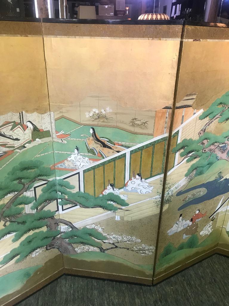 A mesmerizing Edo period six panel byobu screen with intricately hand painted Imperial courtyard scenes, flowing waters, rolling landscapes on gold leaf by a member of the Tosa School and based on the classic Japanese 11th century literary work