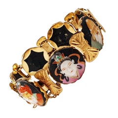 Japanese Toshikane Ari 7 Lucky Gods 18 Karat Gold Porcelain Bracelet circa 1940s