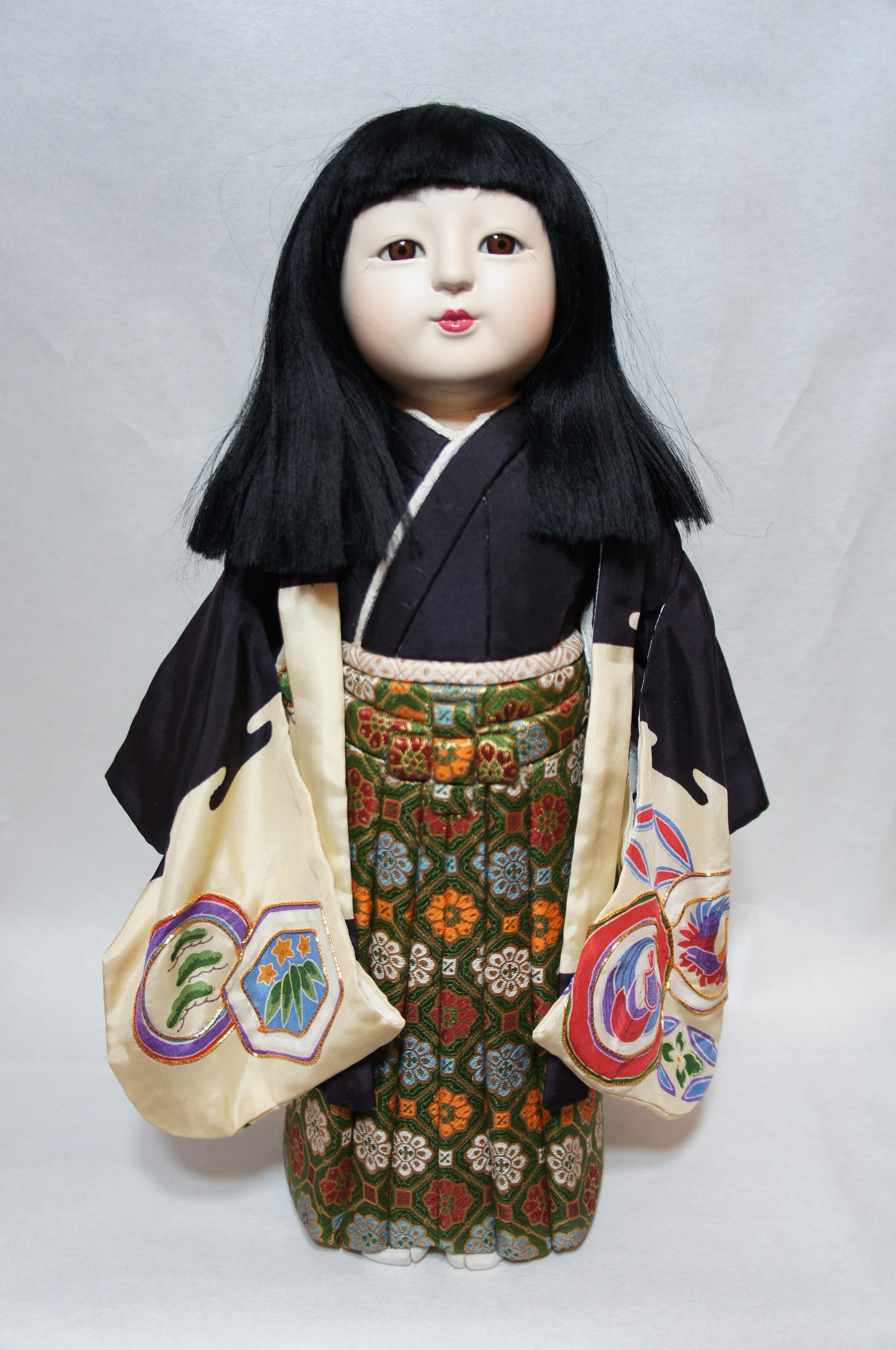 Beautiful Japanese traditional kimekomi ichimatsu boy doll.
The doll wear the beautiful Hakama and haori that were made of silk. 
This doll's body was made of wood, and face was made of plaster by hand. The face was painted by hand.

Kimekomi