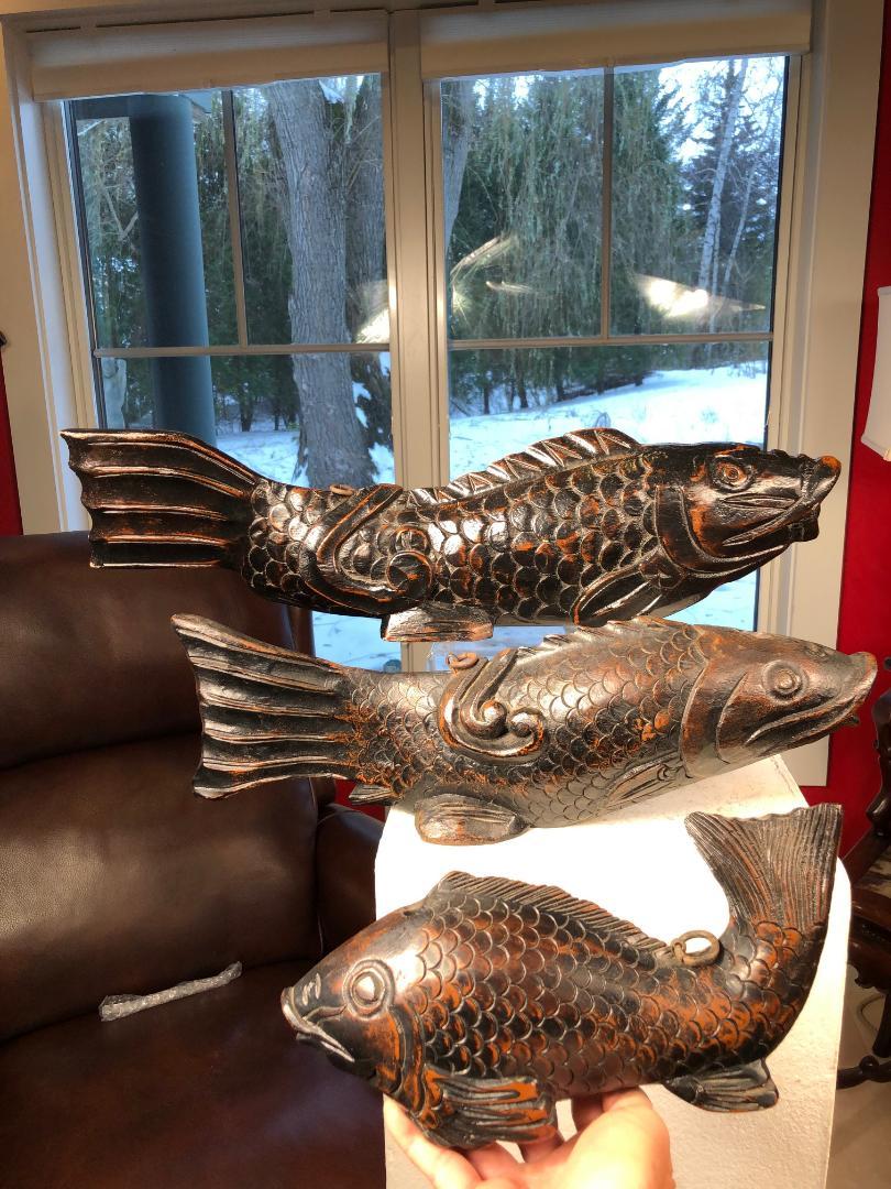 From our recent Japanese Acquisitions Travels- a big catch.

Unique set of three (3) large scale fine old Japanese 19th century hand carved wooden KOI fish symbolic of prosperity, perseverance and good fortune. This biggest fish holds the round