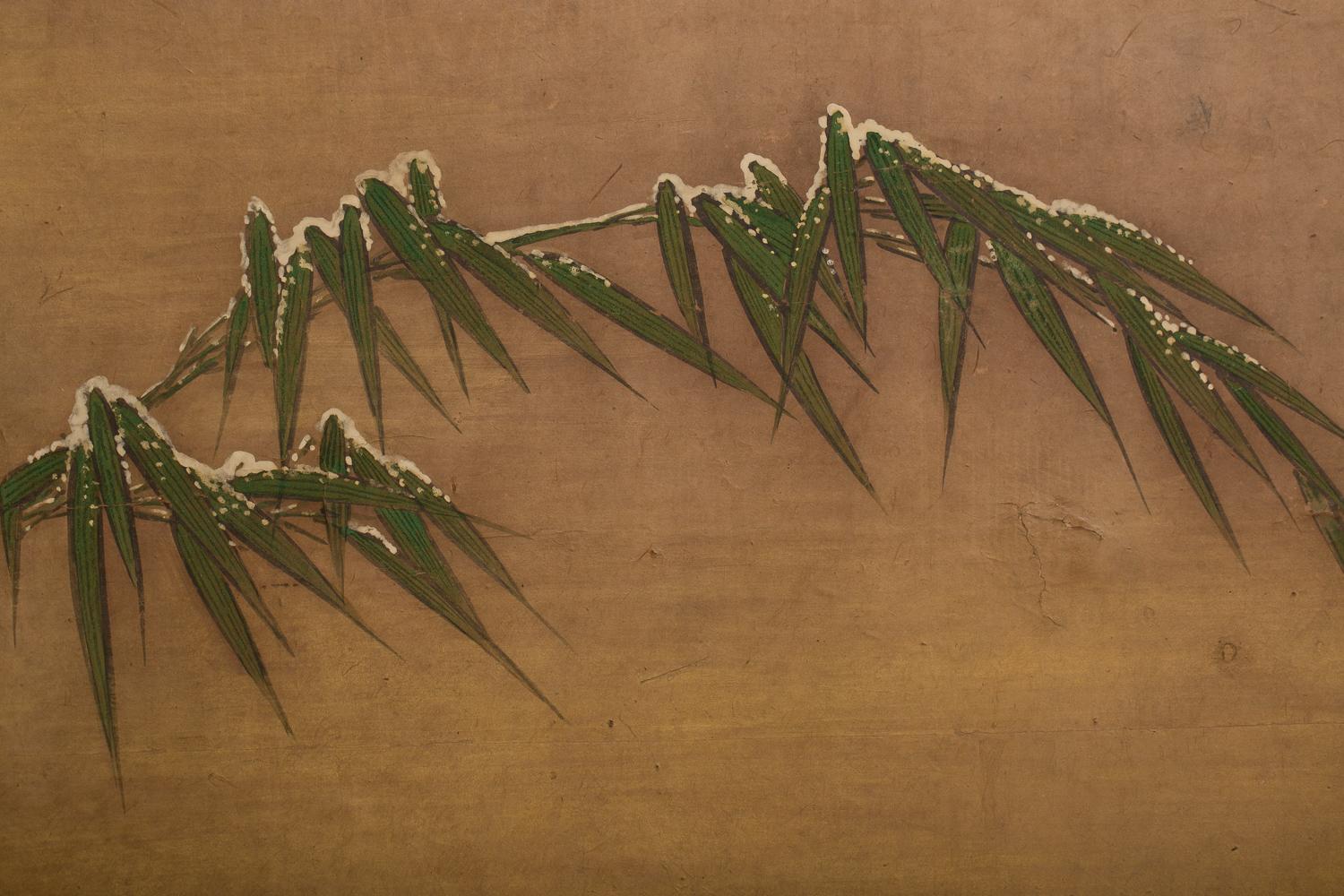 Kano School painting, of the edge of a bamboo grove in early winter snow with very fine gold mist. Mineral pigments and gold dust on mulberry paper with 18th century brocade.