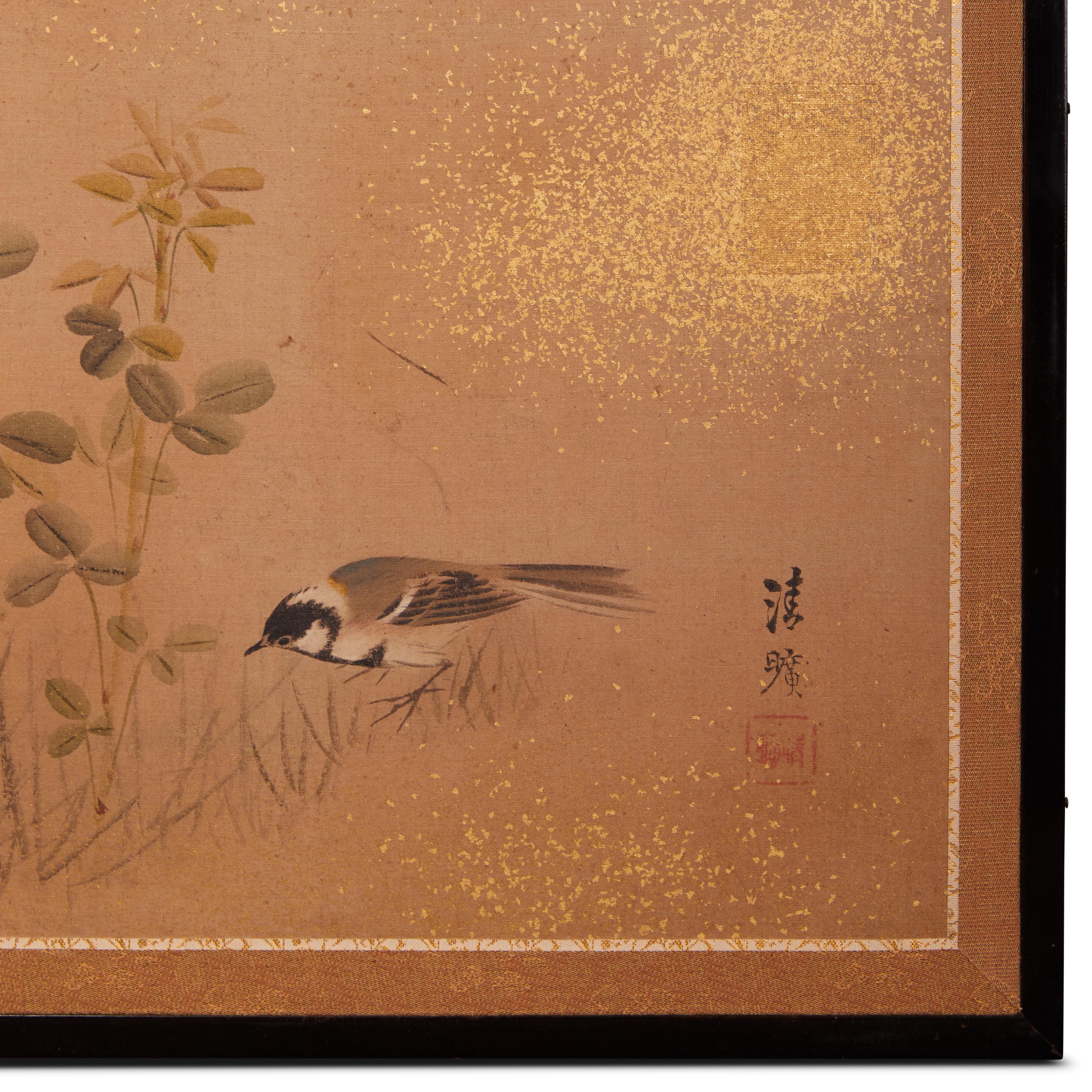 Meiji period painting (1868 - 1912) of a sparrow investigating the area beneath blooming wildflowers, including blue colored bell flower.  Painted in mineral pigments on silk with gold dust and a silk brocade border.  Signature and seal read: