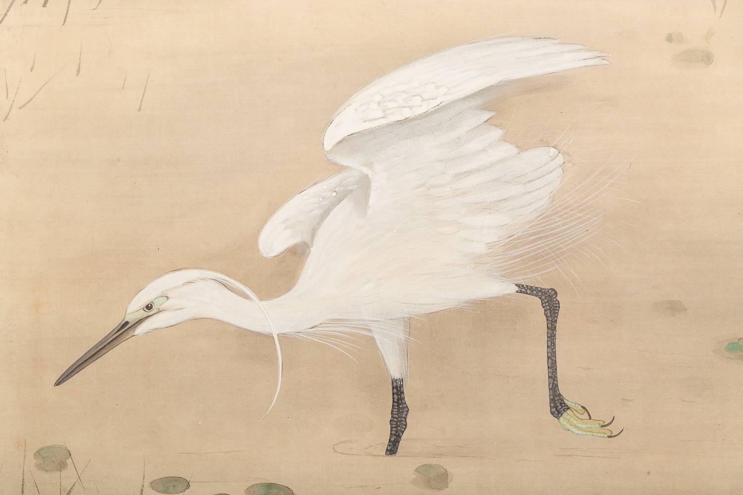 Japanese Screen painted with Heron In Water Lily Pond Under Willow.  Meiji period (1868 - 1912) painting of a heron at pond's edge.  Painted in mineral pigments on mulberry paper.  Artist's seal reads: Yoshi Take / Houshou.  One of a pair with