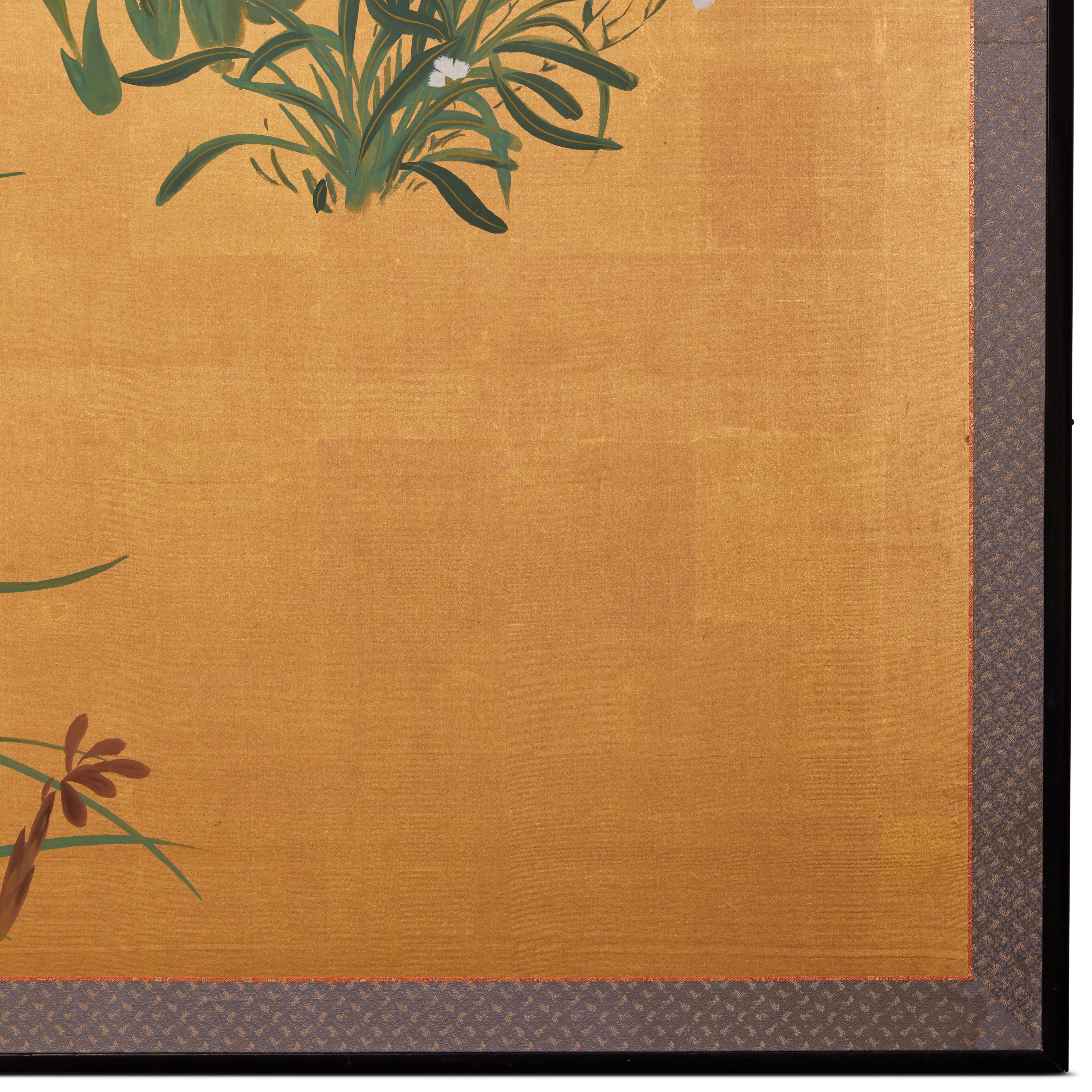 Showa period (1926 - 1989) painting with a strong design of exotic lilies and a cluster of nadeshiko (dianthus) under a silver moon on gold.  This painting has a modern flair, which is indicative of the time it was painted.  In the 1950s, Japanese