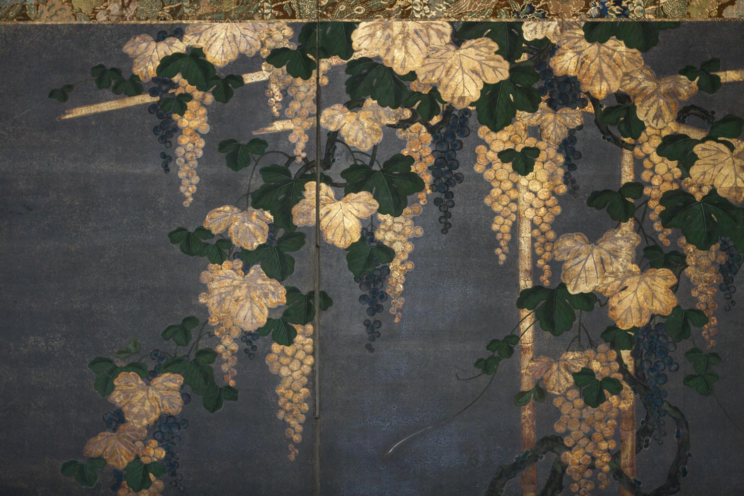 Interesting and unusual technique of an oxidized background, likely representing night time, giving the grapes and leaves a luminous quality, catching the moonlight. Delicately painted, with lichen on the base of an old grape vine. Mineral pigments