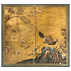 Japanese Two Panel Screen of a Tragopan Standing on Rocks by Plum Blossoms