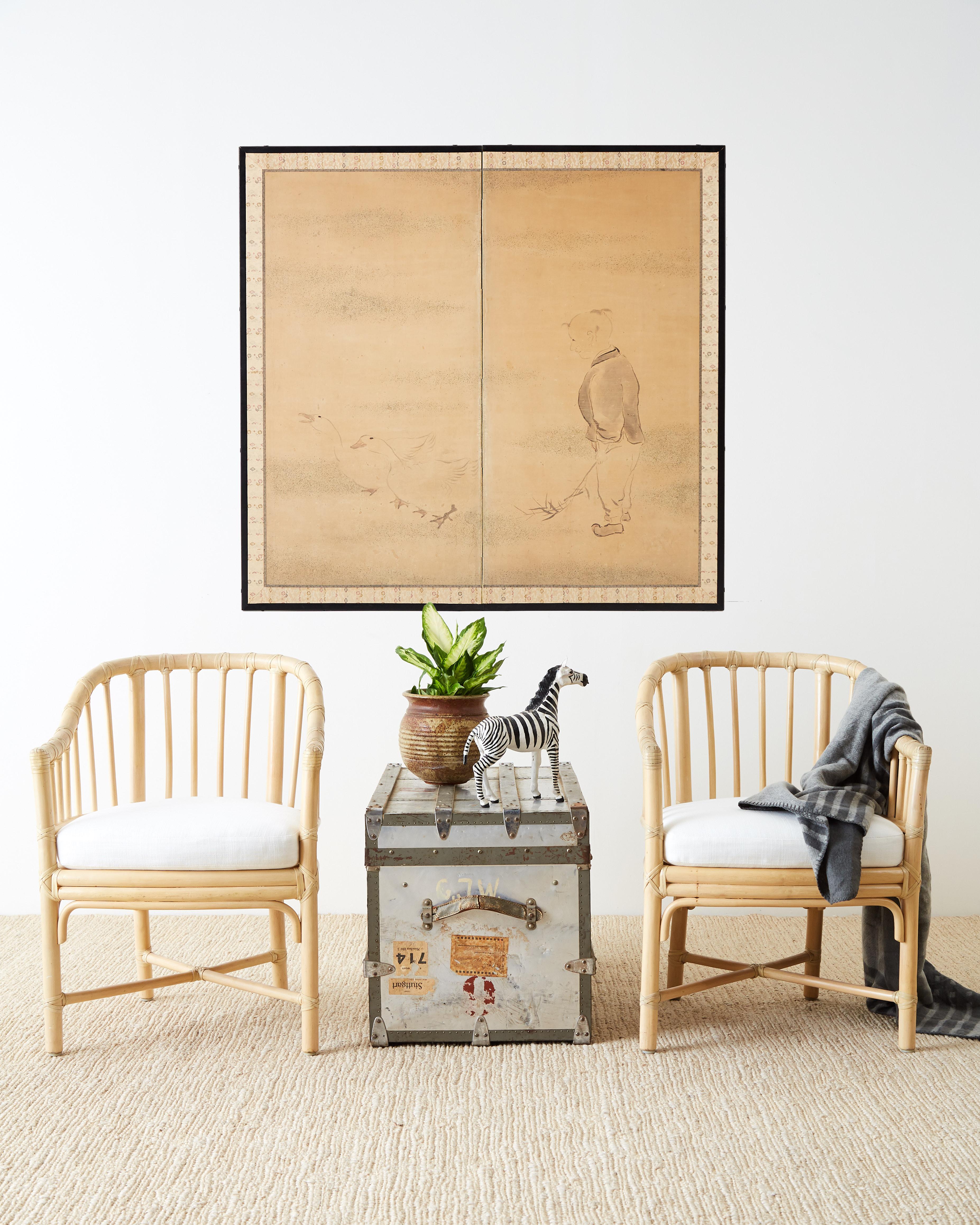 Interesting Japanese Meiji period two-panel Byobu screen depicting a child holding bamboo shoots and following a pair of geese. The faded landscape in the background once decorated with gold specs is now only remnants. The painting is set in an