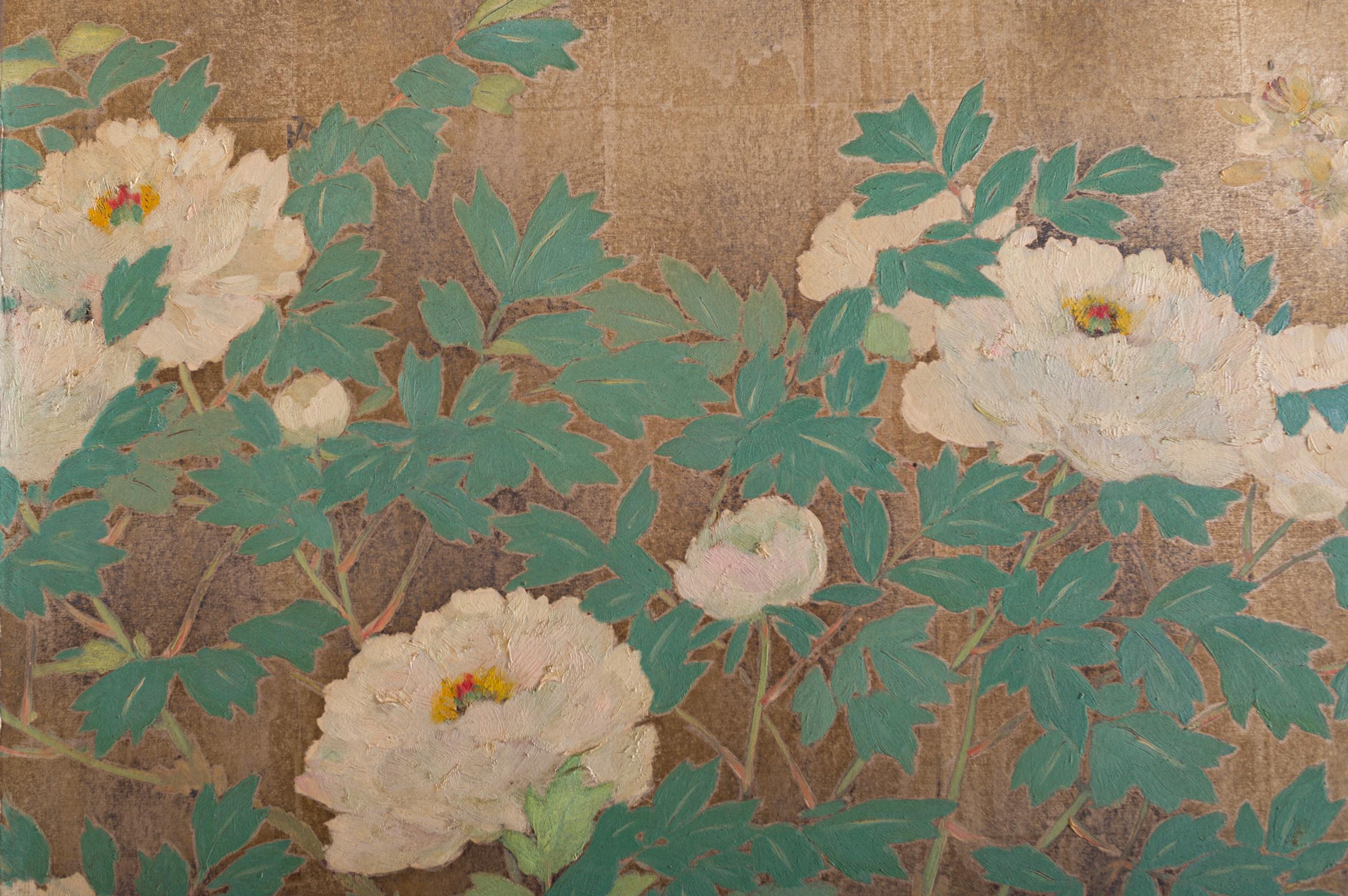 Japanese two-panel screen: Peony, Wisteria, cherry and bamboo on soft silver, Meiji period (1868-1912) painting of a garden in spring. Painted in mineral pigments on oxidized silver leaf. Screen has beautiful fabric backing. Condition is good with