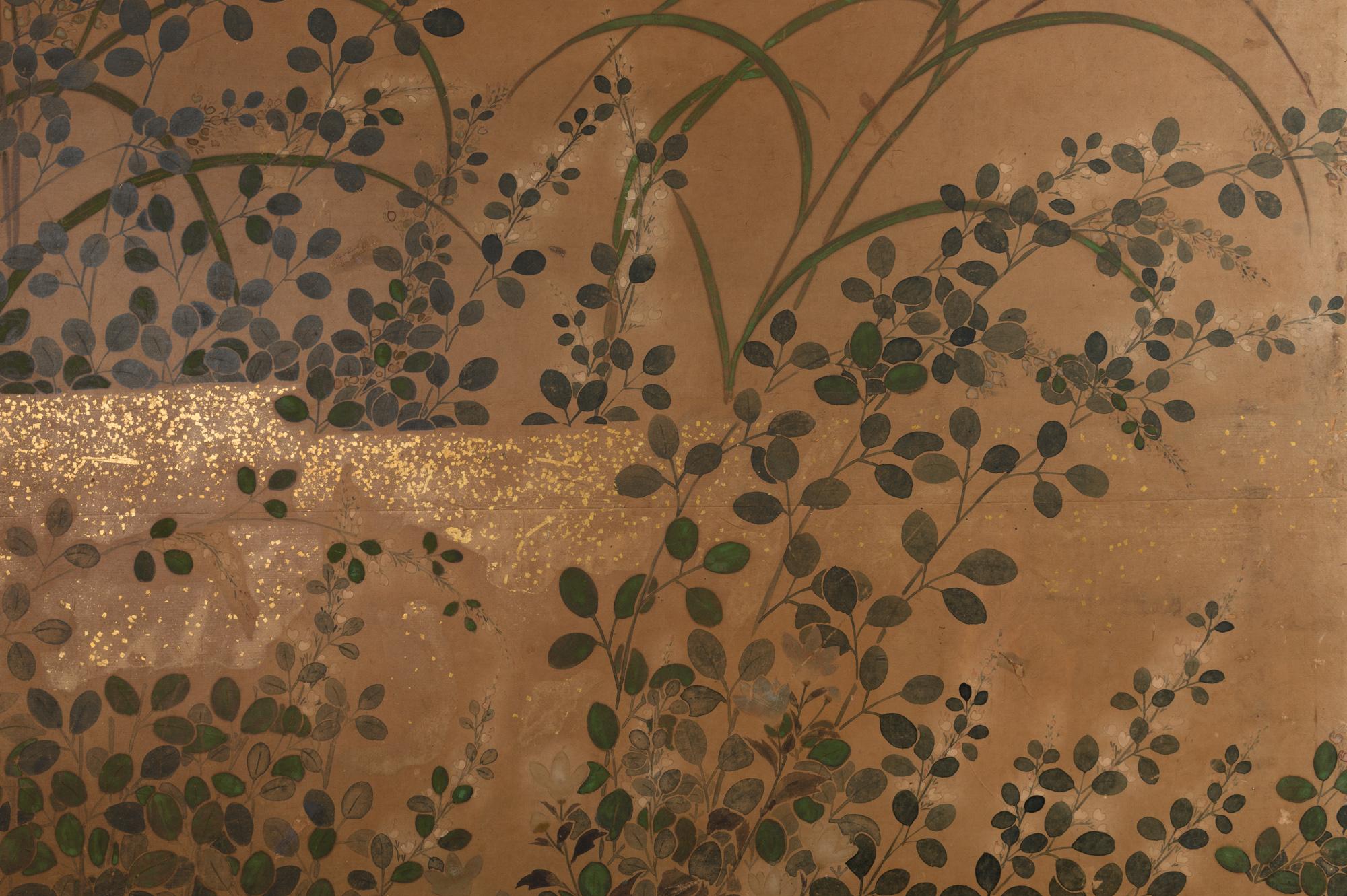 Japanese two-panel screen: Rimpa floral landscape. Late Edo period (early 19th century) soft painting of wild flowers (including bushclover, thistles, and bellflower) and grasses painted in mineral pigments on paper with gold dust. Mounted with 19th