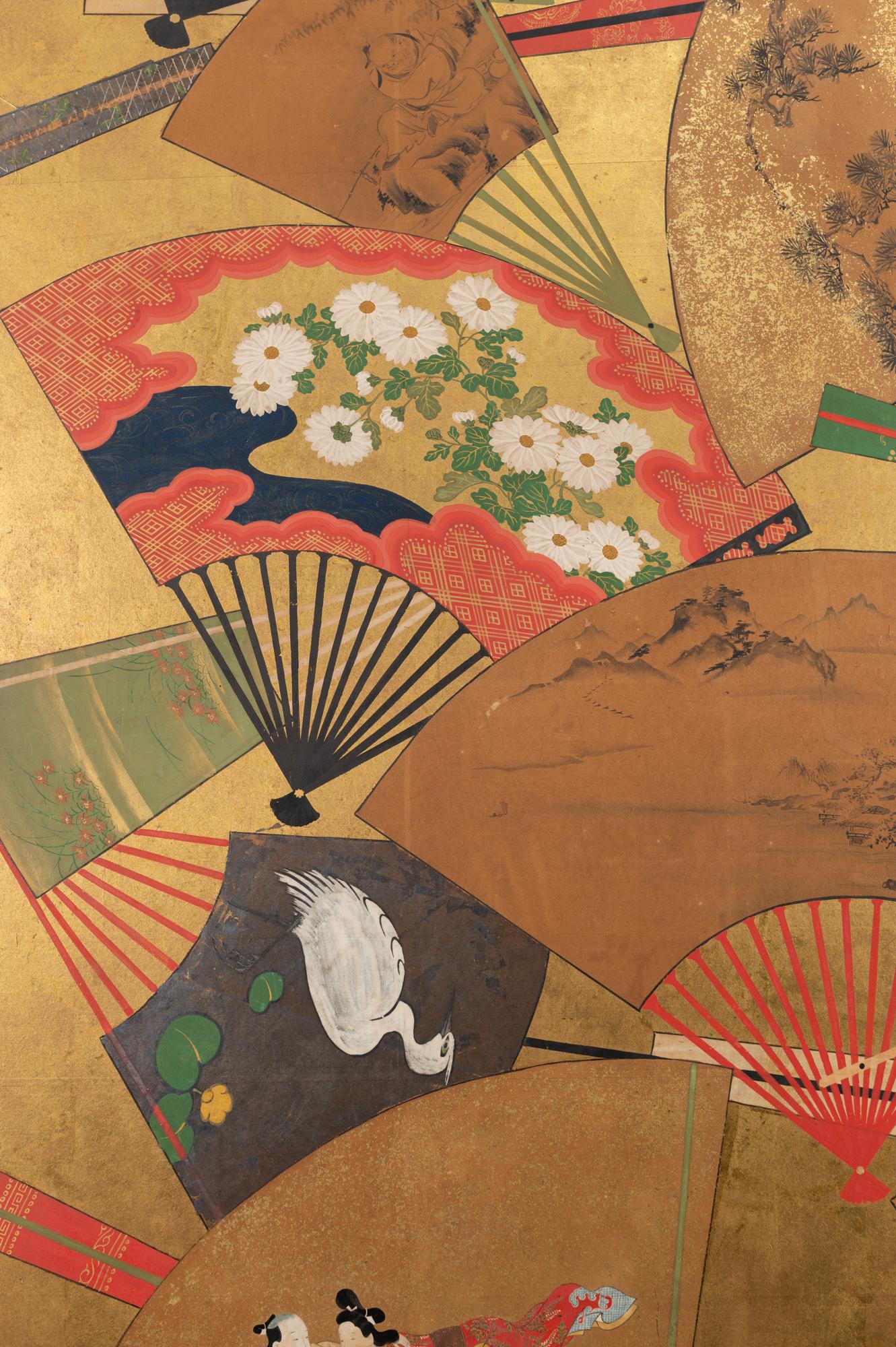 Japanese two-panel screen: Rimpa painting of fans on gold. A beautifully painted Edo period (early 19th century) Rimpa School painting of fans featuring traditional motifs in Japanese art: samurai, cherry blossoms, Mt. Fuji, waves, and more. A