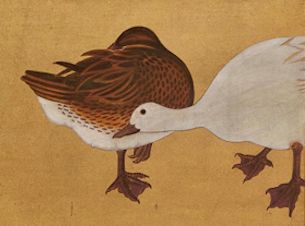 Japanese Two Panel Screen: Water Fowl by River's Edge, Showa period (1926 - 1989) painting of fowl on a river bank.  Very art deco in style.  Painted in mineral pigments on gold paper with a silk brocade border.  