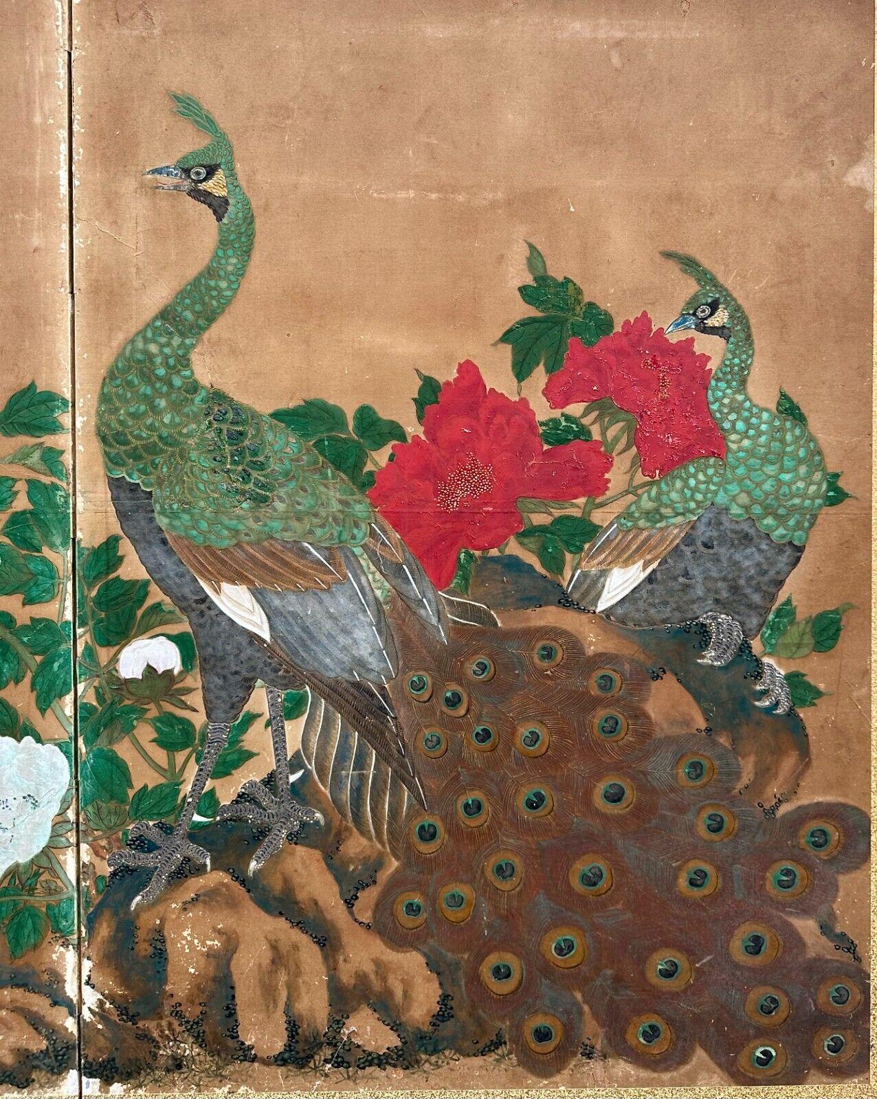 Japanese Two-Panel Screen with Peacocks and Blossoms 

This exquisite Japanese two-panel screen depicts a pair of elegant peacocks surrounded by delicate red and white blossoms. The vivid flowers accentuate the graceful presence of the birds,
