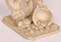 Japanese Unglazed Pottery Figure of a Pedlar Being Stung by a Wasp