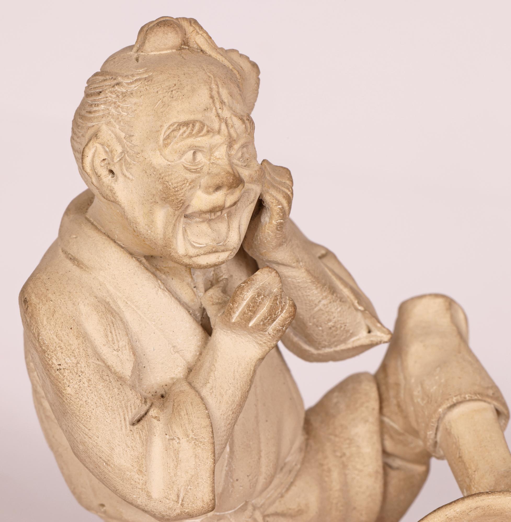 Other Japanese Unglazed Pottery Figure of a Pedlar Being Stung by a Wasp For Sale