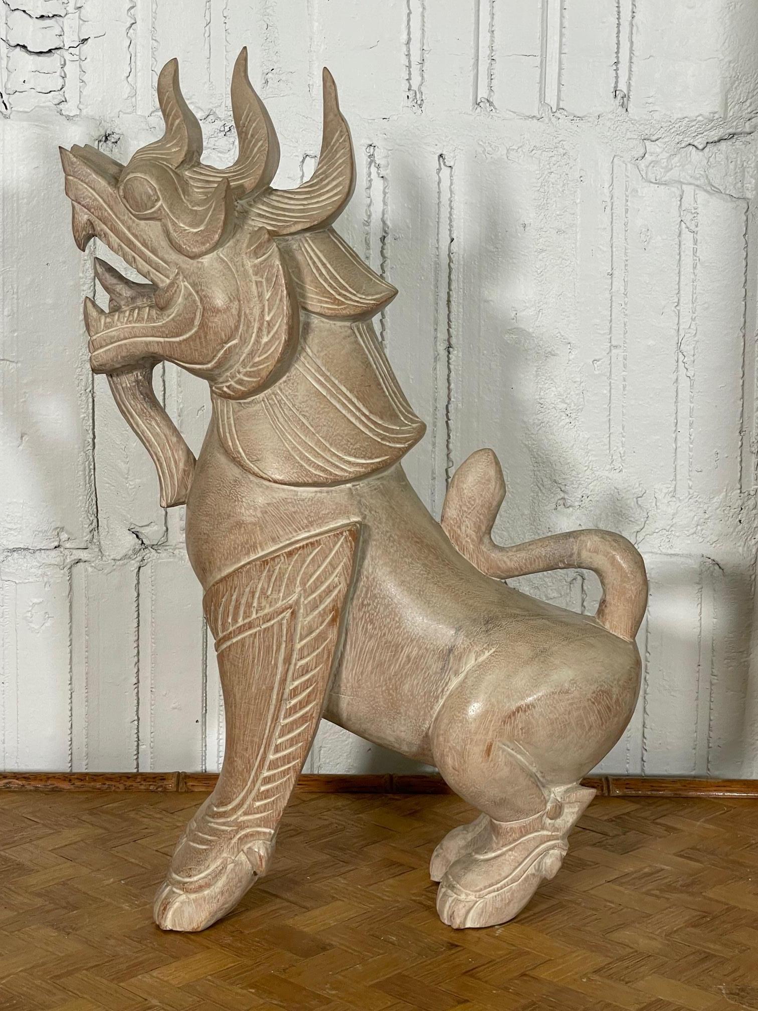 Carved wood Qilin, or Japanese unicorn, also referred to as Kirin. Stands 19.5