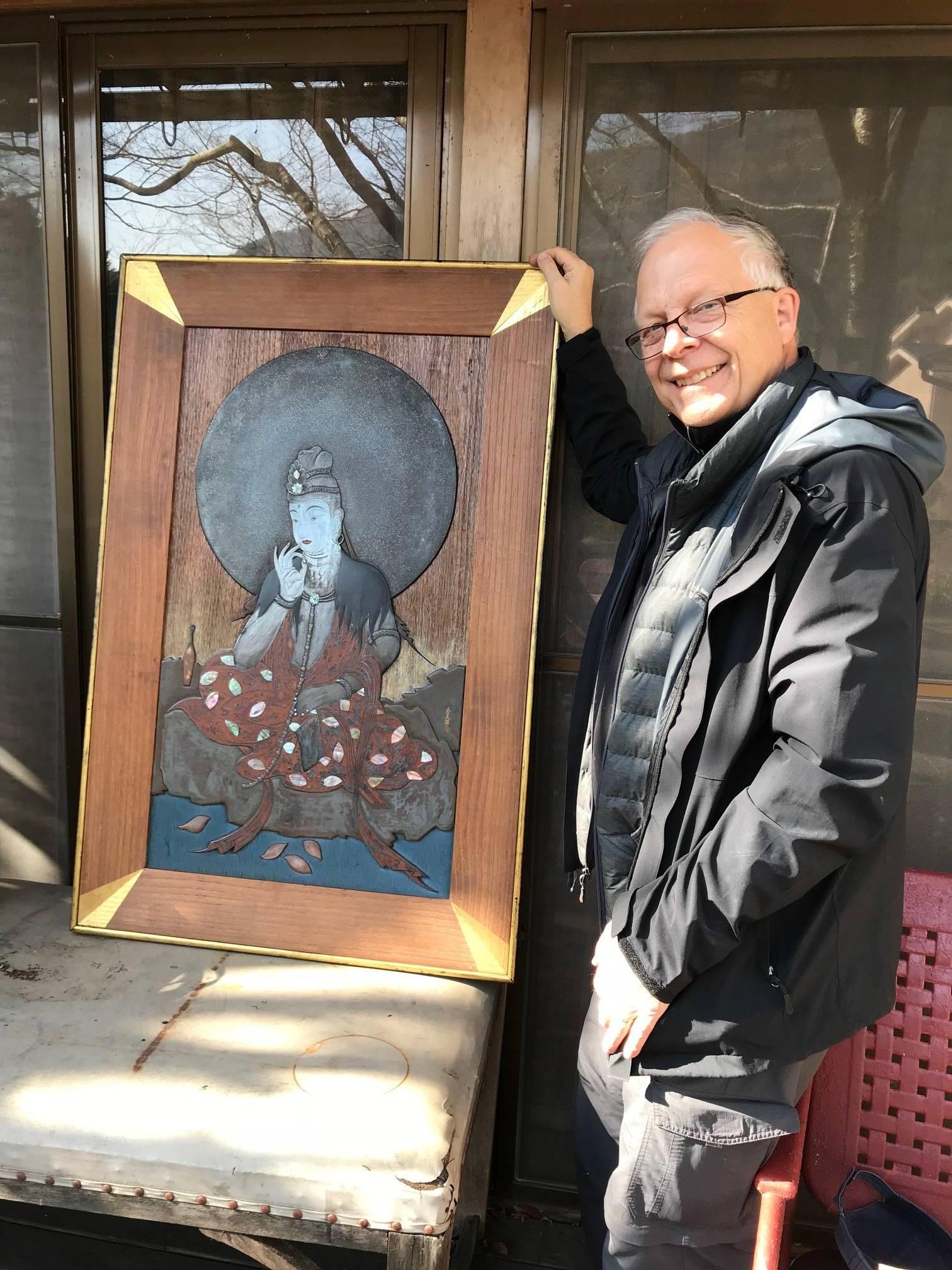 
Unique, Rare find. Once gifted by the Emperor of Japan.

This unique and elegant Japanese framed Kannon effigy - goddess of mercy- was created with a distinct Art Deco flavour by a master midcentury artisan. The blissful Kannon -Kyusei- exhibits