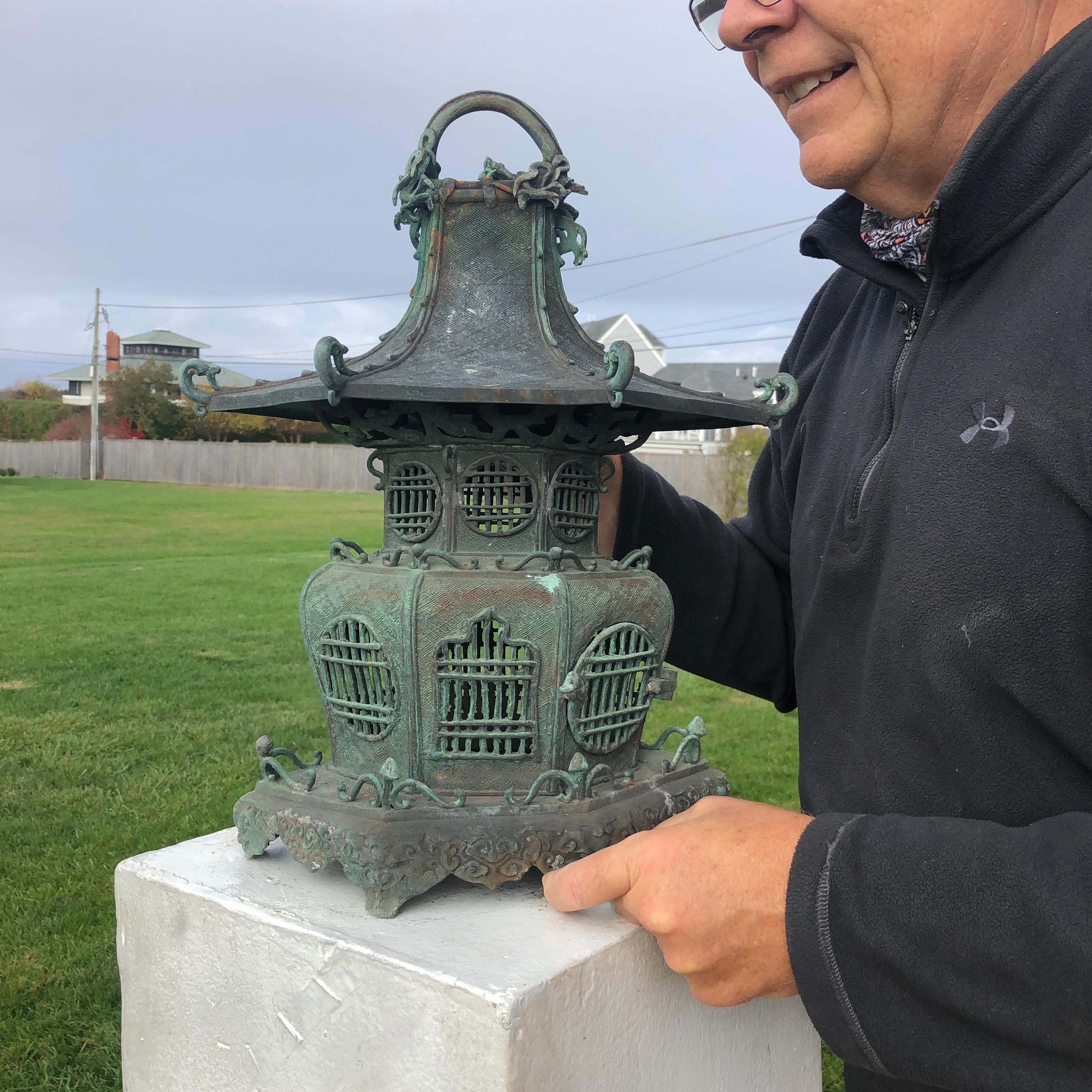 From our recent Japanese acquisitions in original condition

First we have seen

Japan, a substantial and attractive and sturdy 18 inch high lantern with a finely rendered dragon motif at its top. 

Found from a Japanese tea garden. 

Fine