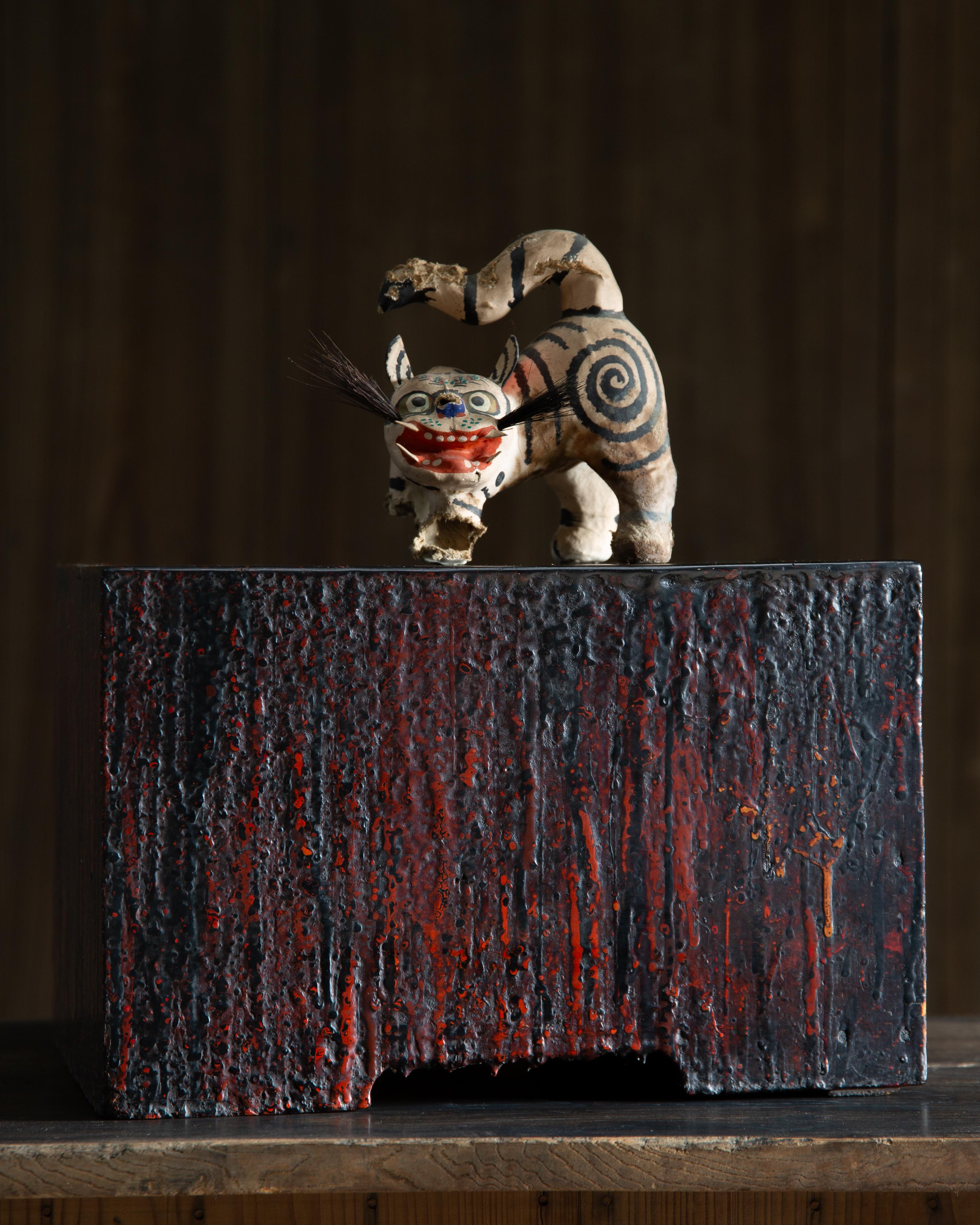 At the first glance, this looks like an art piece done by a modern abstract artist - with the layers of random, thicker paint on it.
But the truth is, this small box chest of drawers is called 