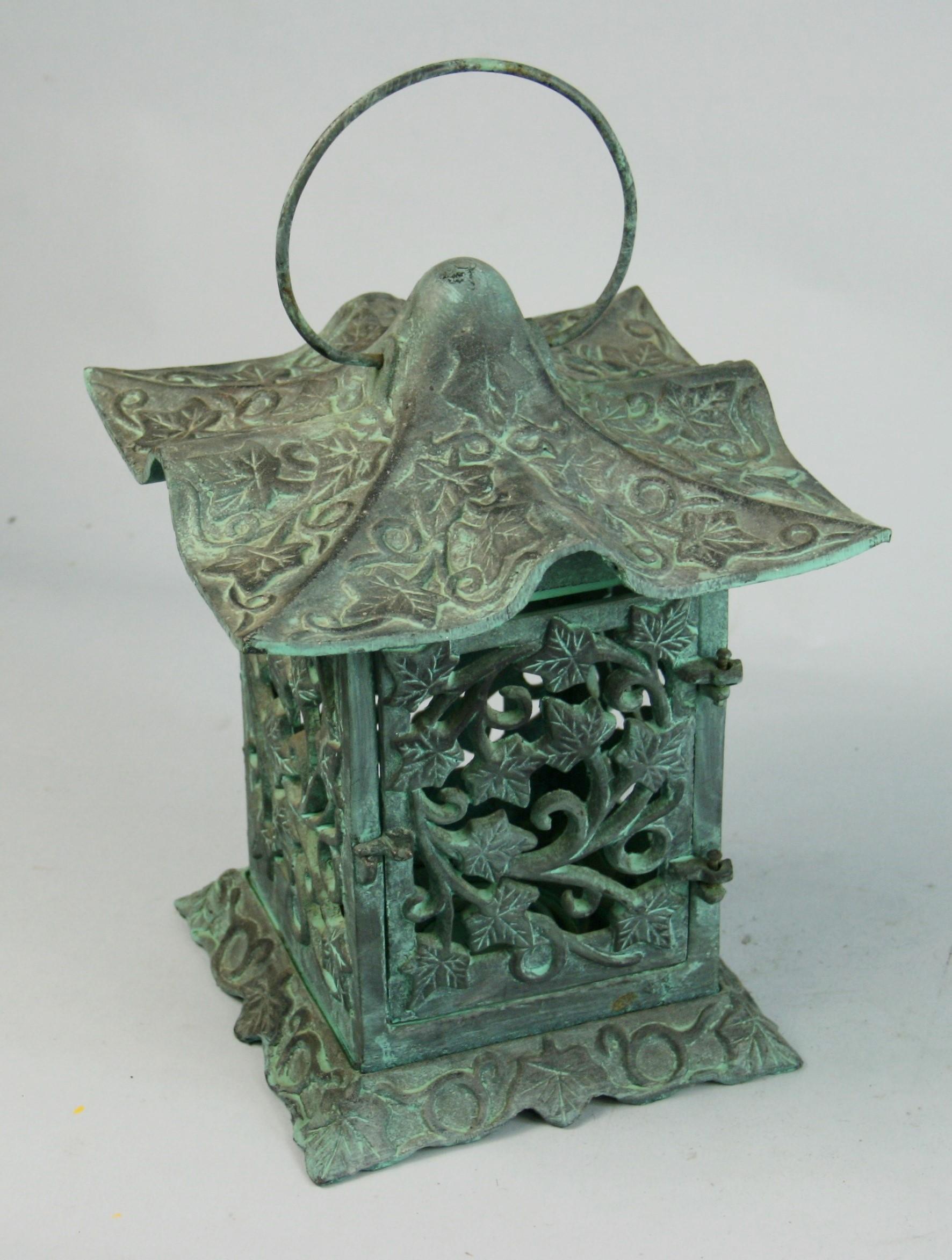 Japanese pagoda candle lantern with leave designs 
Height with loop 13