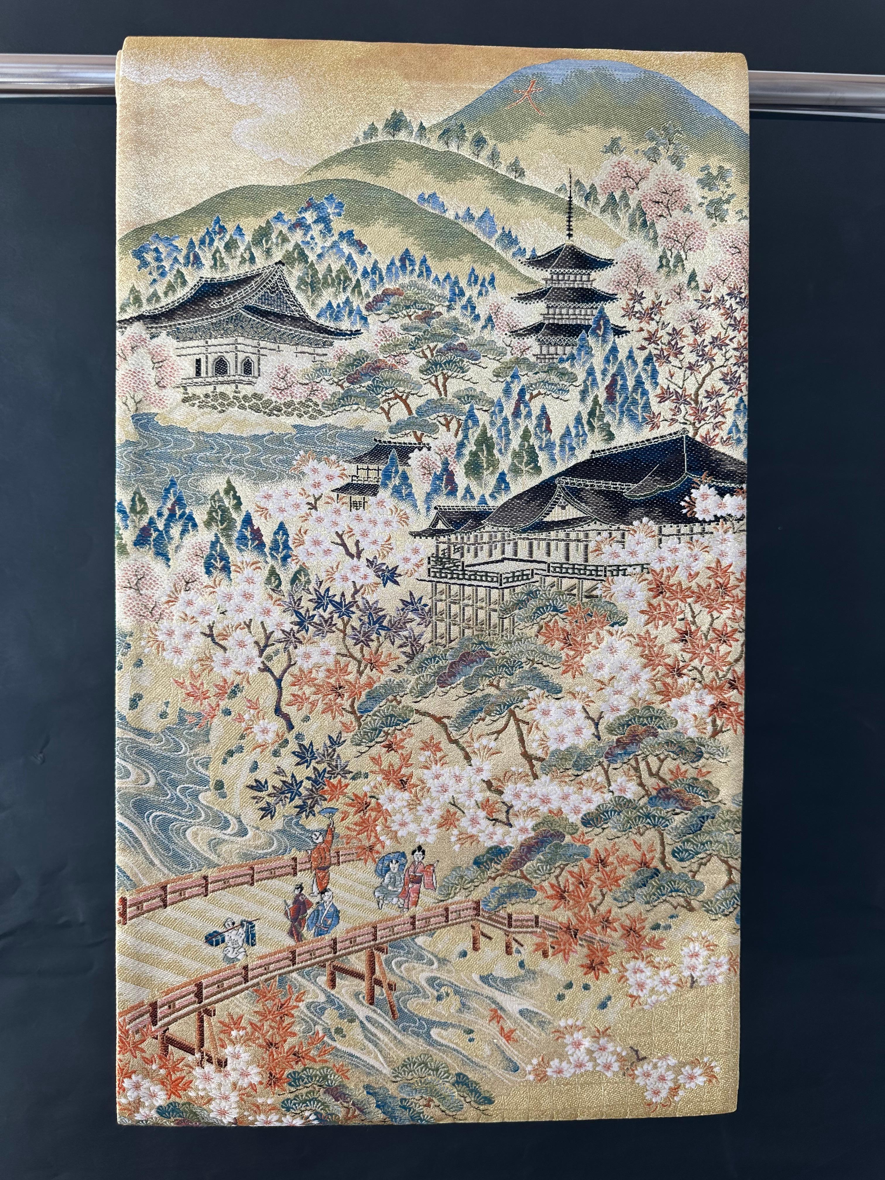 Japanese Vintage Kimono Obi (Kimono Sash) selected by Kimono-Couture

-Dimension:434×31cm
-Condition:Very Good Condition
-Shipping Method: DHL

This kimono obi is decorated with beautiful scenes of Kyoto, the ancient capital of Japan, including
