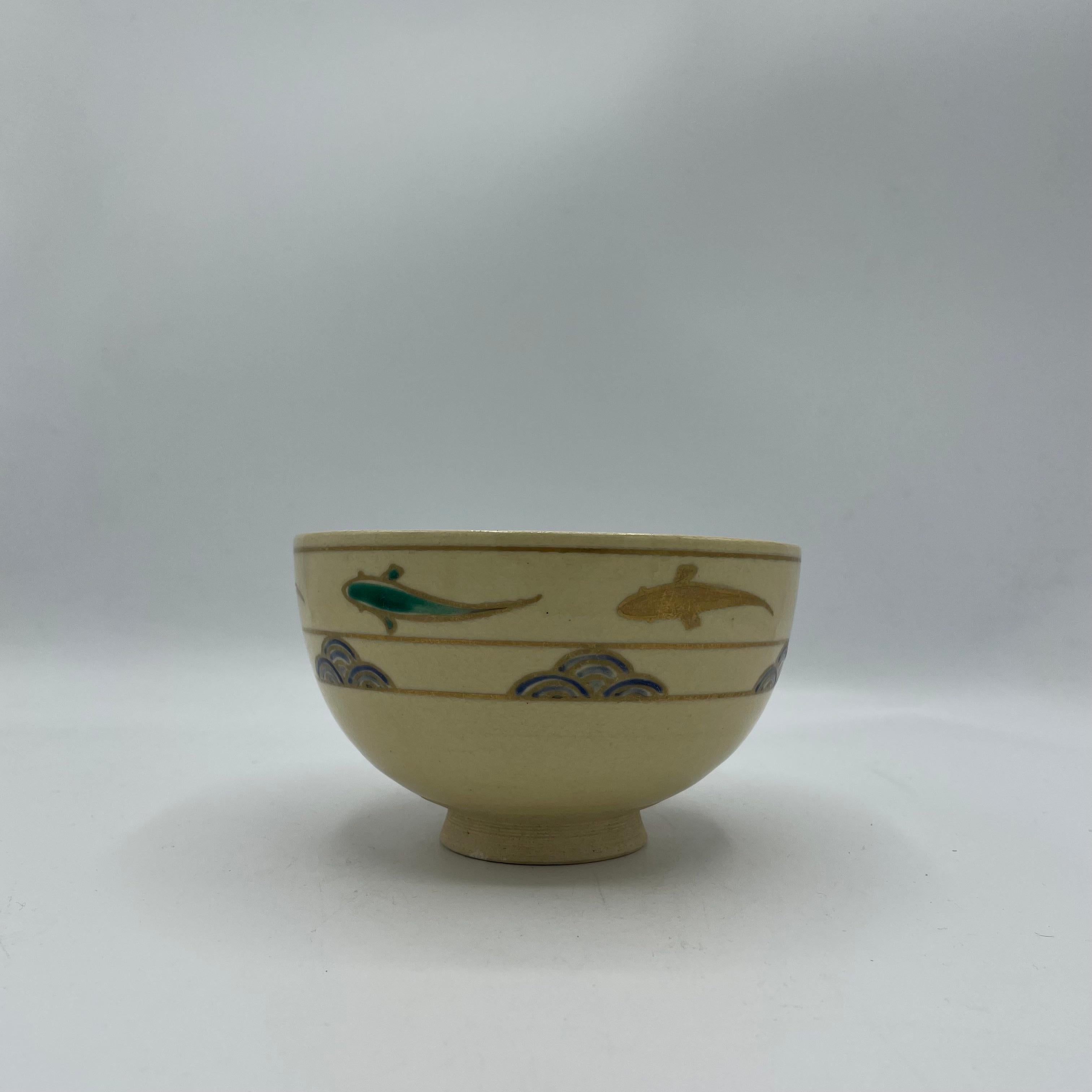 This is a Matcha bowl which we use for tea ceremony and this bowl was made in Japan around 1980s in Showa era.
This bowl is made with Style Kyo-Kiyomizu.
Kyo-kiyomizu style is made in Kyoto prefecture.

Kiyomizu ware is a type of Kyō ware