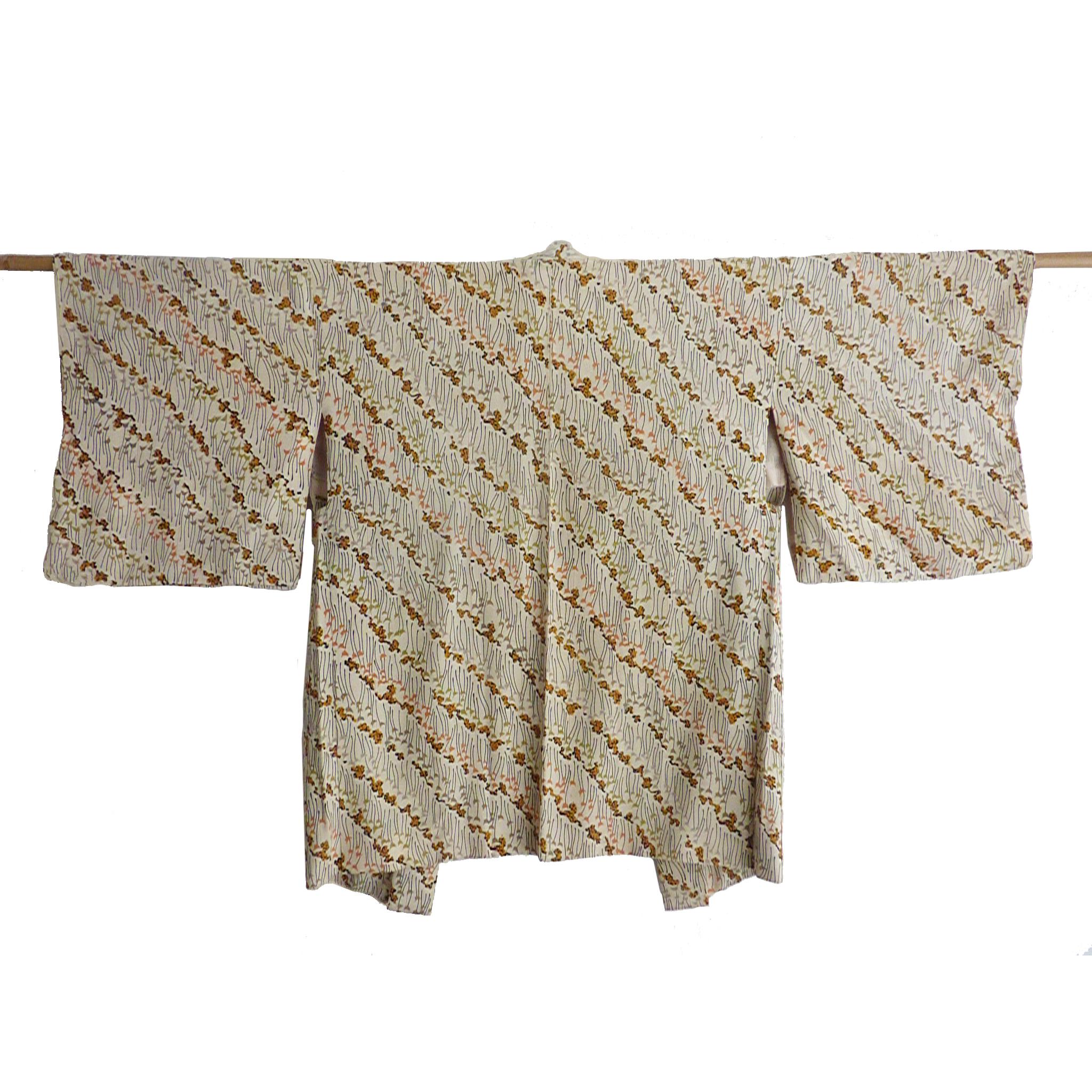 Circa: MEIJI 1890
Place of Origin: Japan
Material: Silk
Print: Wheatgrass
Condition: Excellent
Wheat-ground printed all silk kimono is hand-sewn and handmade in Japan.
 
Total length 34