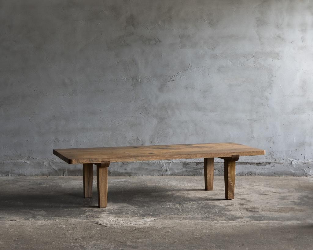 This low table was crafted in the Mid Showa Period'1940-'.

Made with a solid, sturdy design, this table features a rich, durable oak top that adds warmth and character to any space. The legs are crafted from Japanese Keyaki wood, known for its