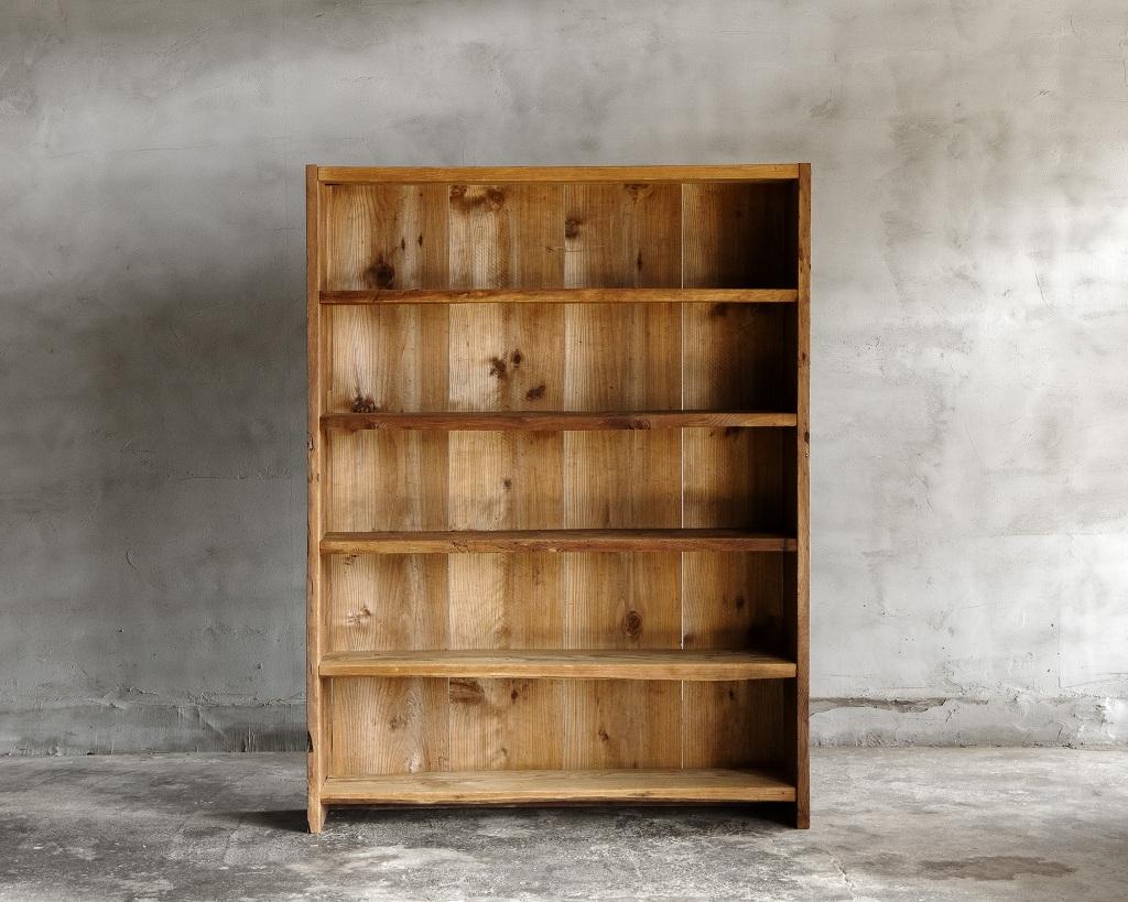 This wooden open shelf was crafted in the Mid Showa Period'1940-'.

This simple yet striking open shelf is made from heavy pine wood, with some parts crafted from cedar, giving it a robust and earthy charm. The rugged feel of the piece adds to its