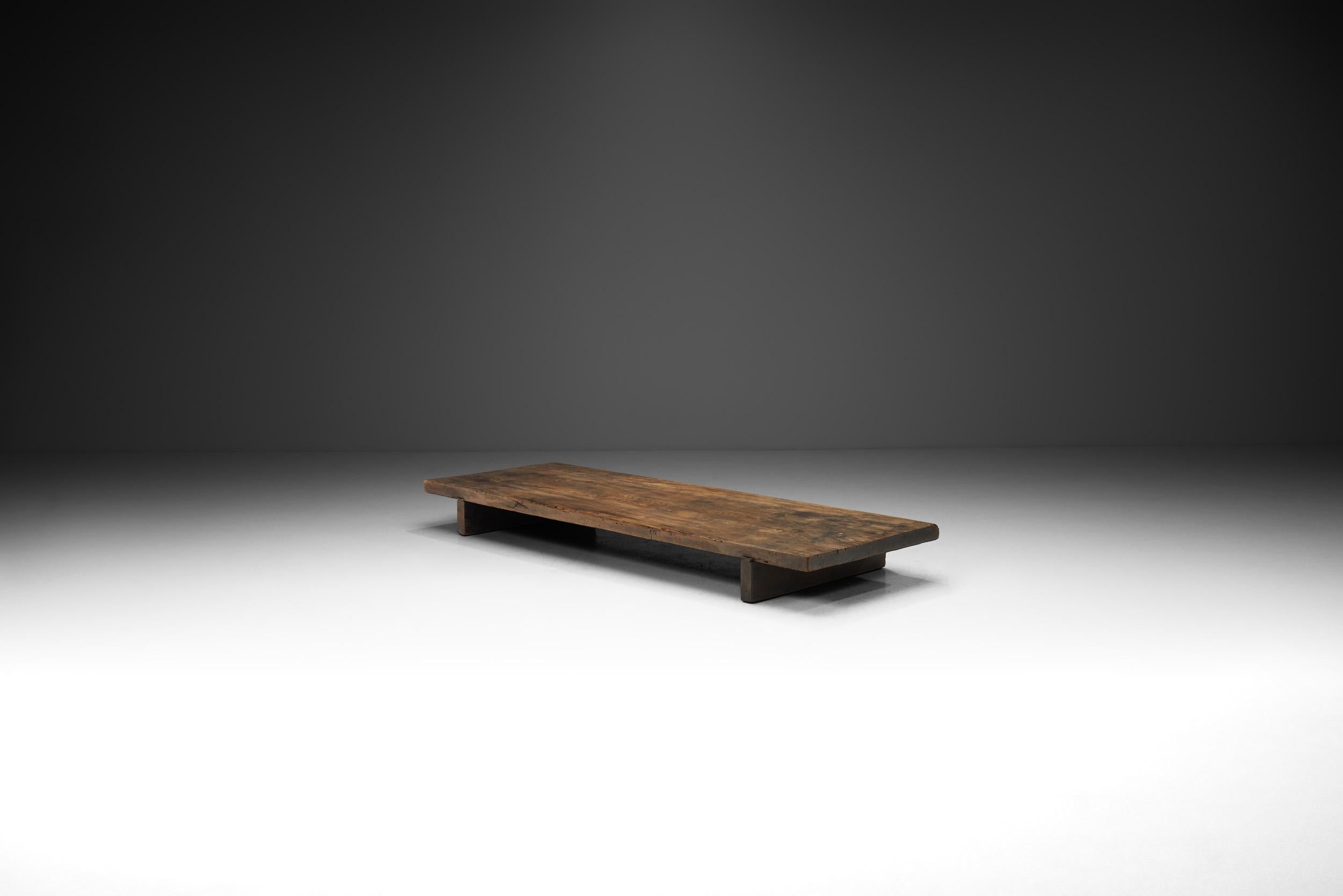 Grounded both figuratively and physically, this stunning low table is all about wood. According to the wabi sabi ideas, there is an elusive beauty to imperfection. Wabi sabi can be understood as an appreciation of a beauty that is doomed to