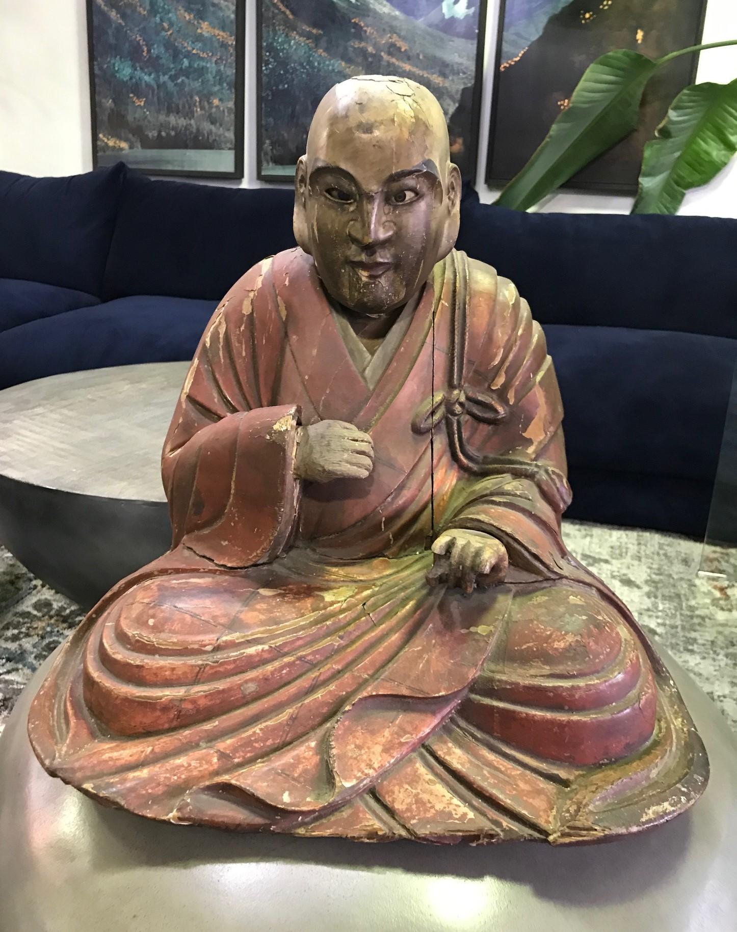 This is truly a wonderful piece with clear age and a nice patina to it. Very unique. We have not seen another quite like it. The monk appears to have glass eyes which gives his expression a very humanistic feel. The head is removable (please see the