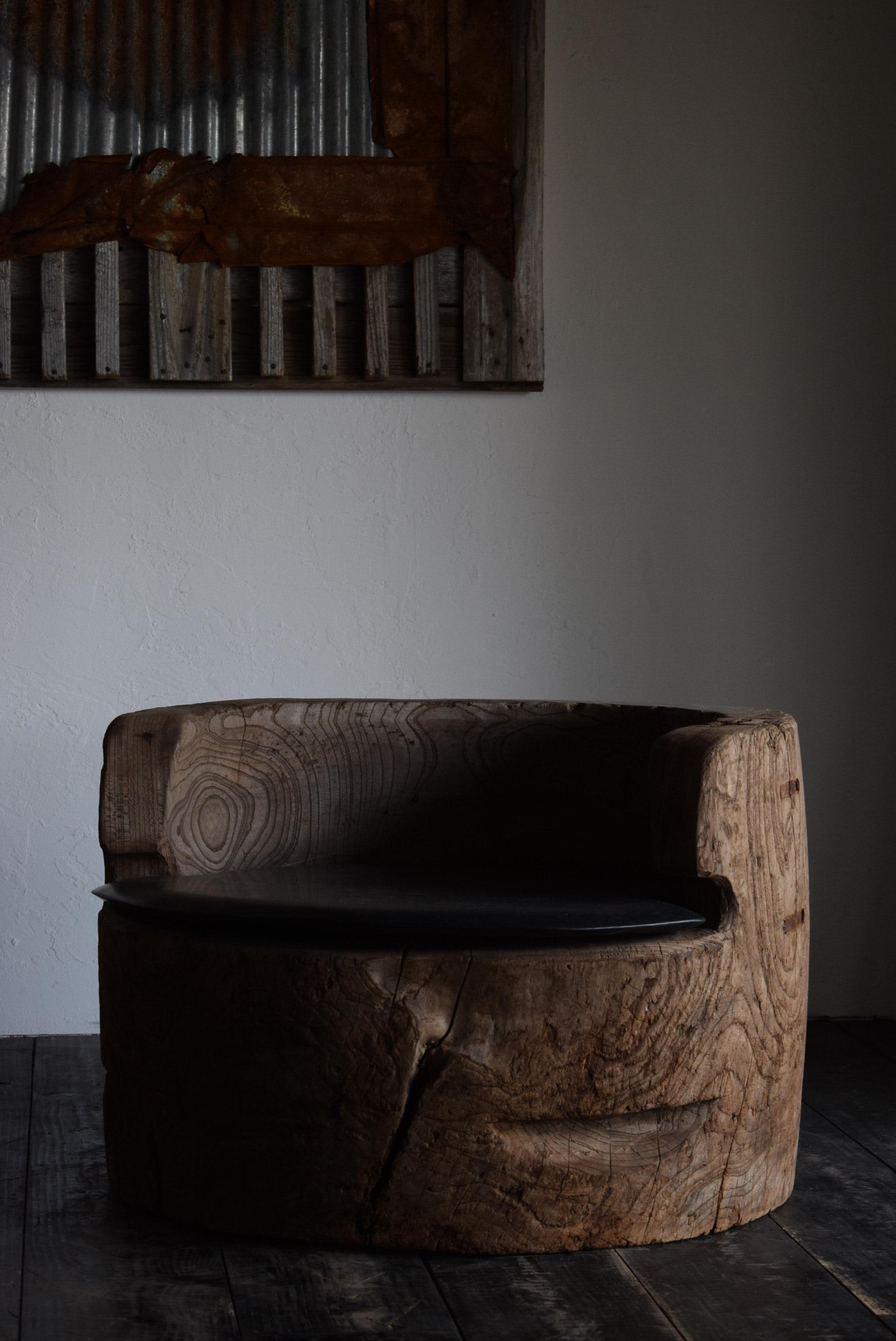 First of all, this chair is extremely rare and one of a kind. 
I've never seen a chair like this before, and I probably never will again. 

This chair is made from an old mortar used in Japan that has been turned into a chair, and has a newly