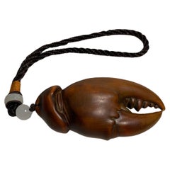 Netsuke giapponese in legno 'Artiglio di granchio' anni '70, epoca Showa