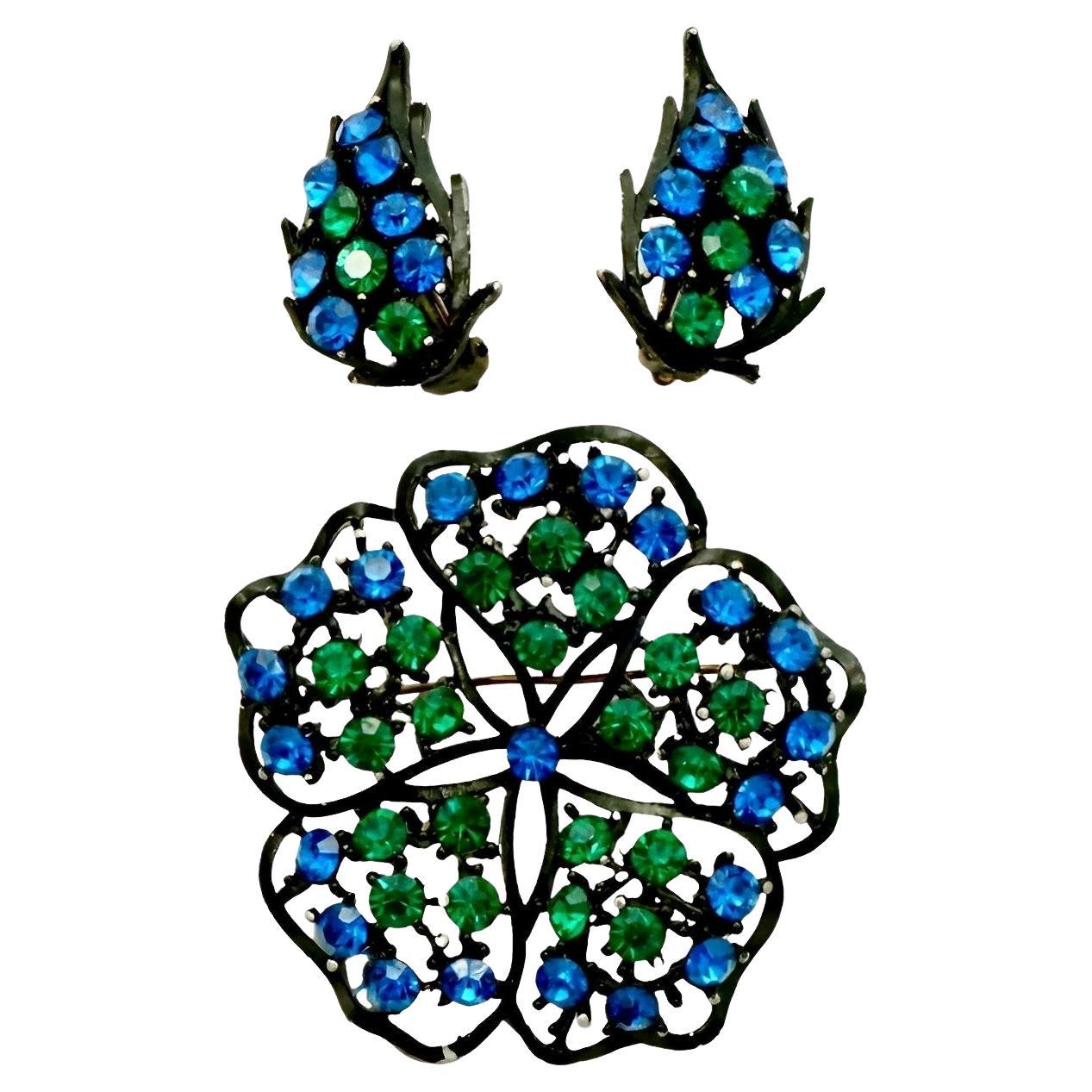 Japanned Blue and Green Crystal Flower Brooch and Leaf Clip On Earrings 1960s For Sale