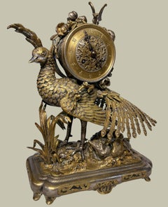 Uhr aus vergoldeter und versilberter Bronze im Japonismus-Stil von E.F. Caldwell & Co.