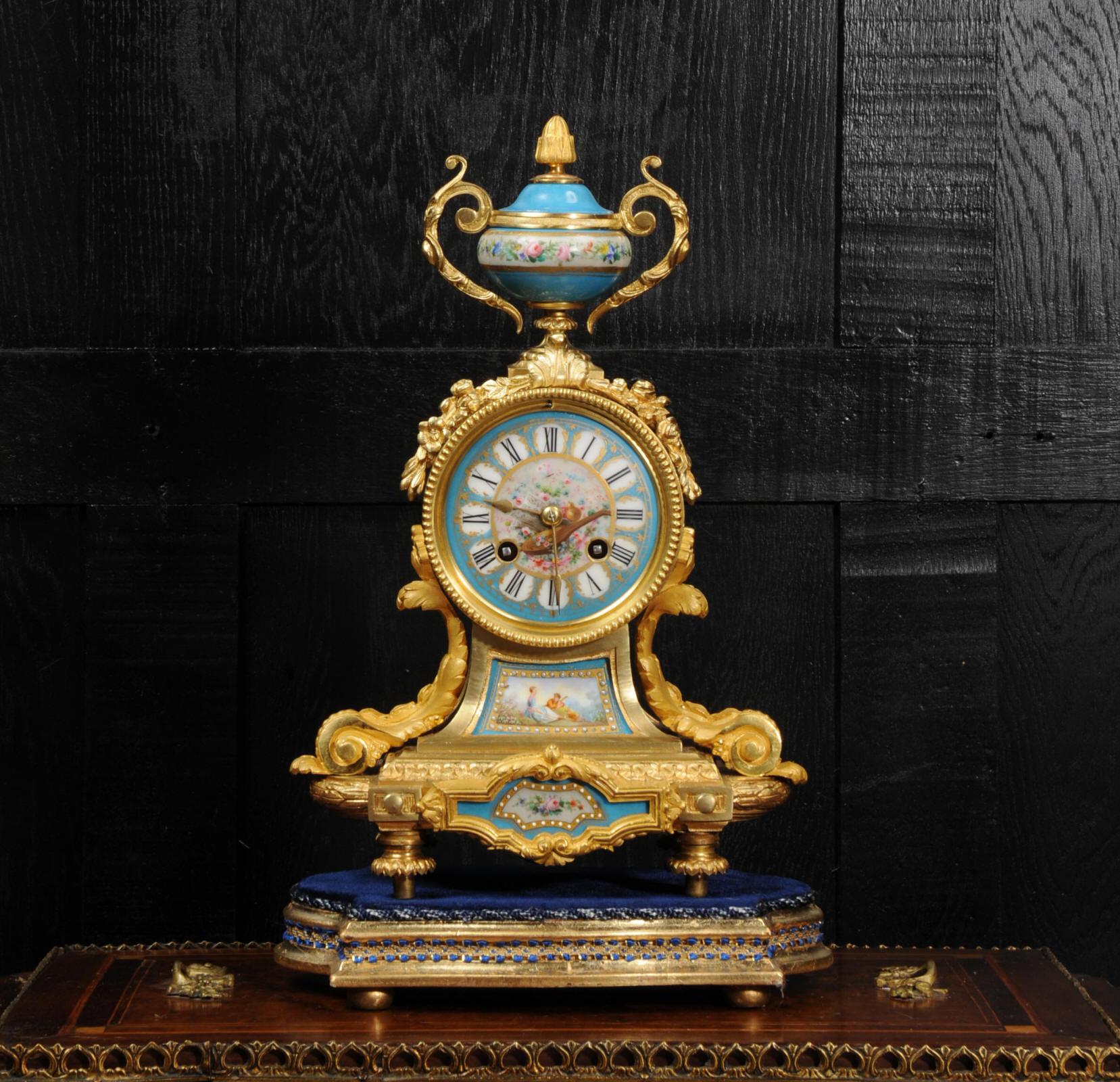 A stunning original antique French clock by Japy Freres, circa 1890. The crisp ormolu (finely gilded bronze), beautifully modelled and chased, is mounted with exquisite Sèvres style porcelain. Porcelain has a blue ground and is delicately painted