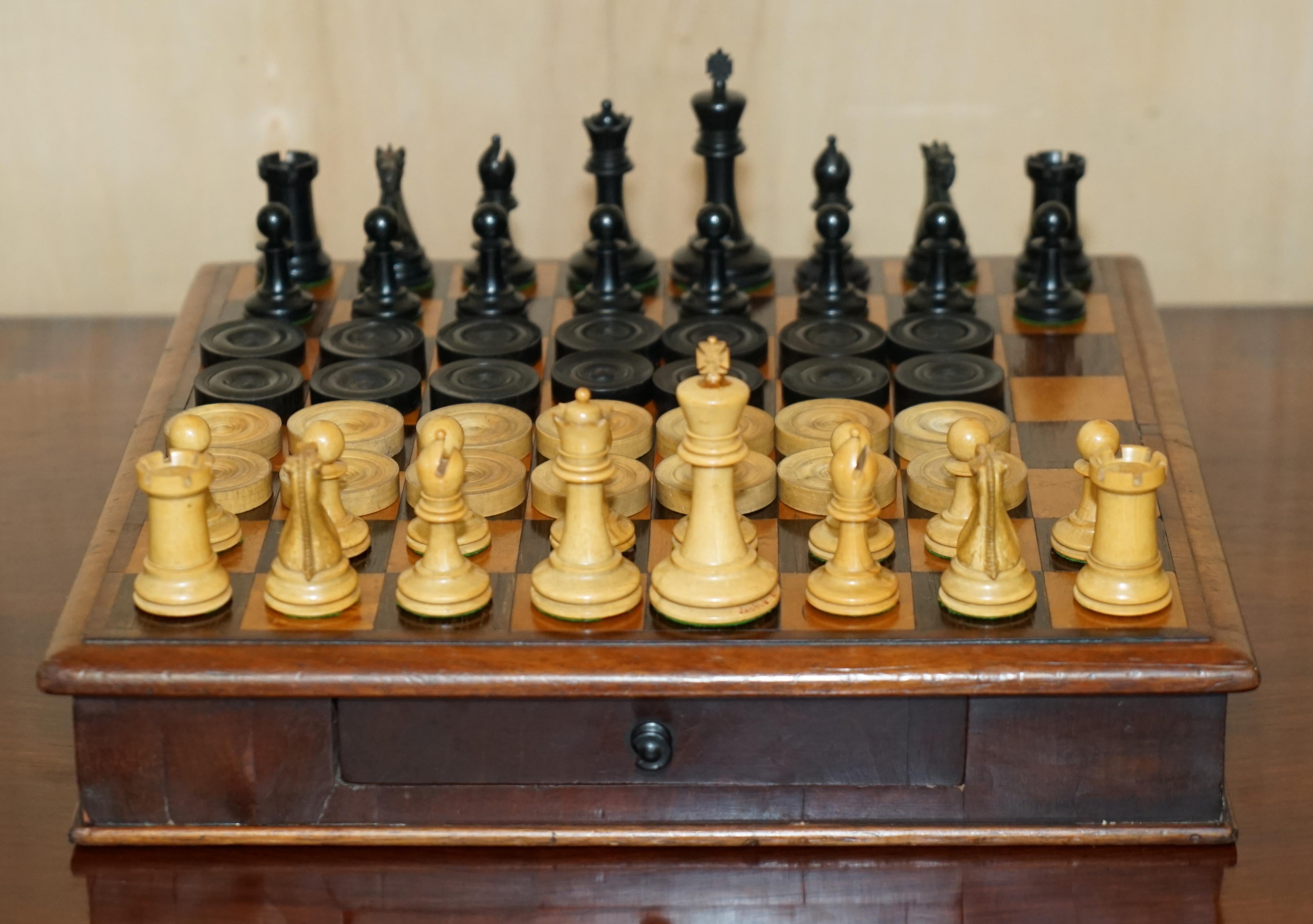We are delighted to offer for sale this stunning original Victorian Antique Jaques of London, Burr Walnut and Mahogany chessboard with the original Jaques Chessmen Staunton Chess set & Backgammon suite dating to circa 1880-1900

A truly stunning