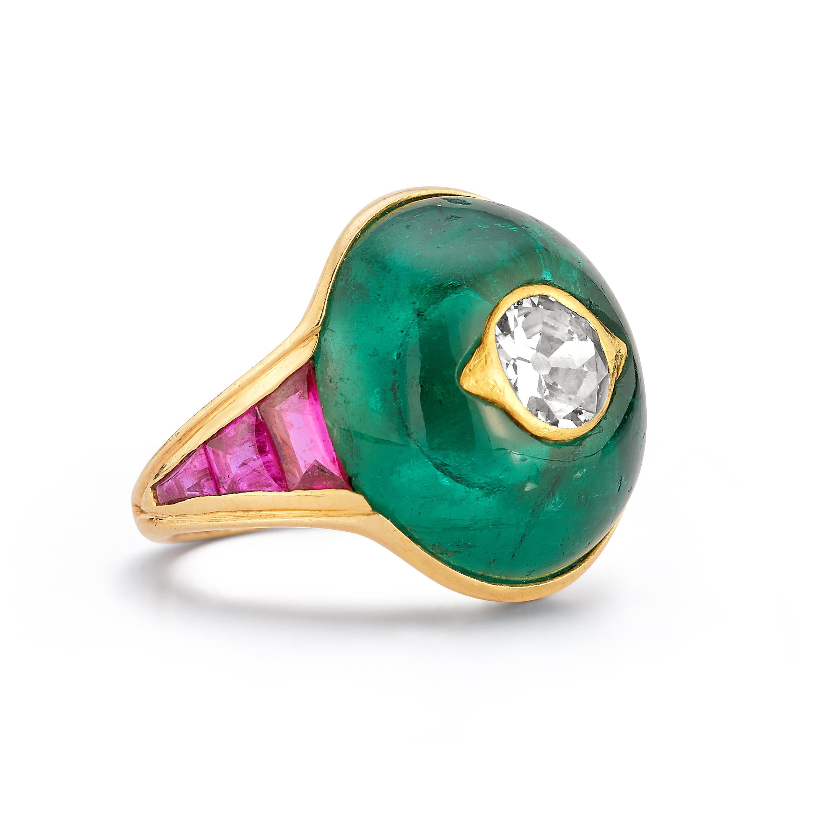 Diamond, Emerald, & Ruby Ring by JAR

An 18 karat yellow gold ring set with a central round cut diamond set inside  a cabochon emerald flanked by 6 buff top rubies 

Signed JAR Paris, maker's mark (Cristofol)

Ring Size: 3

Gross Weight: 8.6 grams