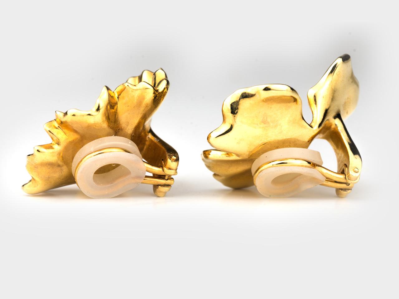 A pair of 18k gold plated aluminum Geranium Leaf Earrings by JAR Paris, French Hallmarks.