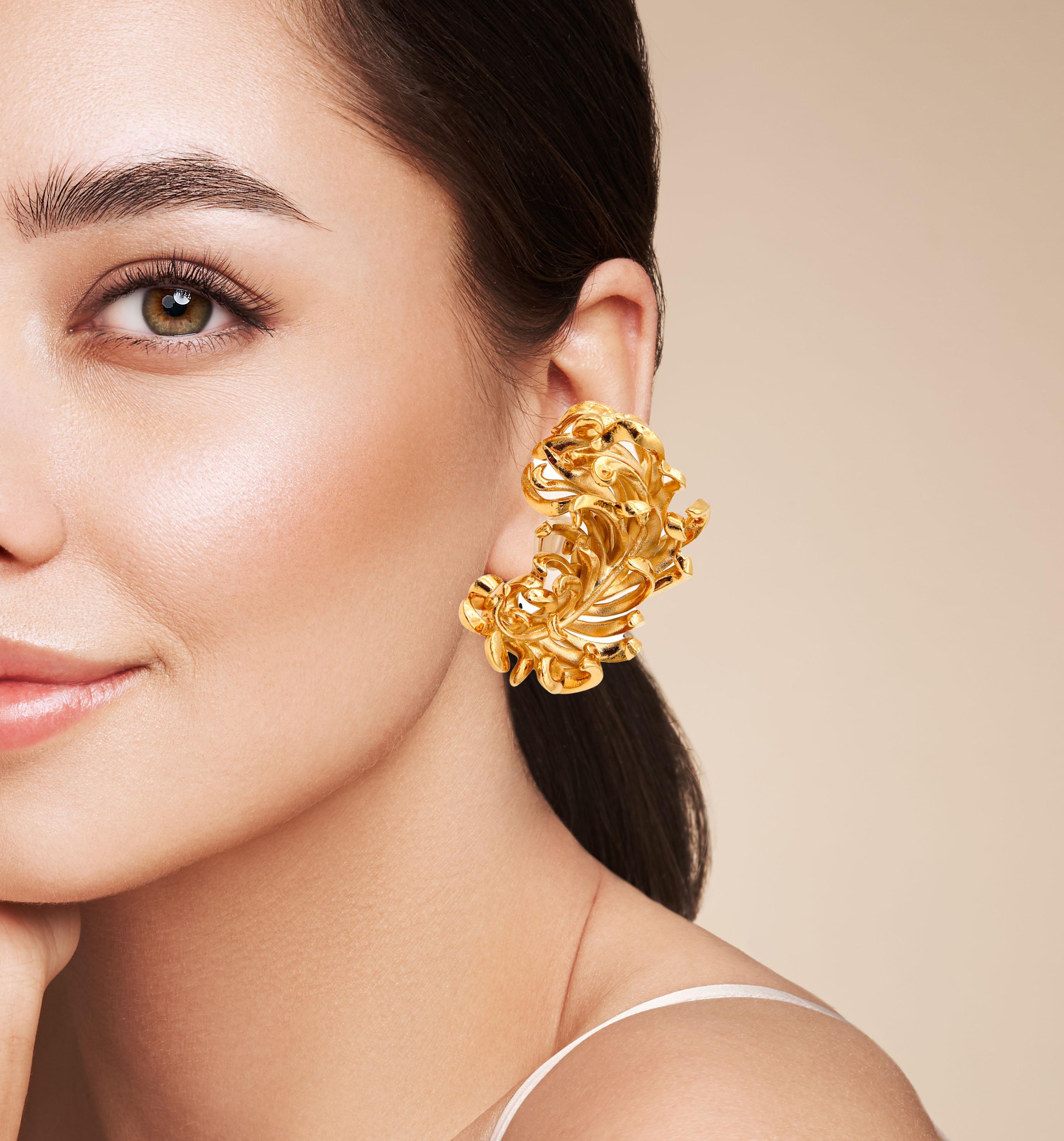 Pair of clips-on earrings designed by JAR Paris.

These are a splendid pair of clips-on earrings, created in Paris France by the iconic luxury jewelry designer Joel Arthur Rosenthal known as JAR Paris. The fabulous earring has been crafted in shiny