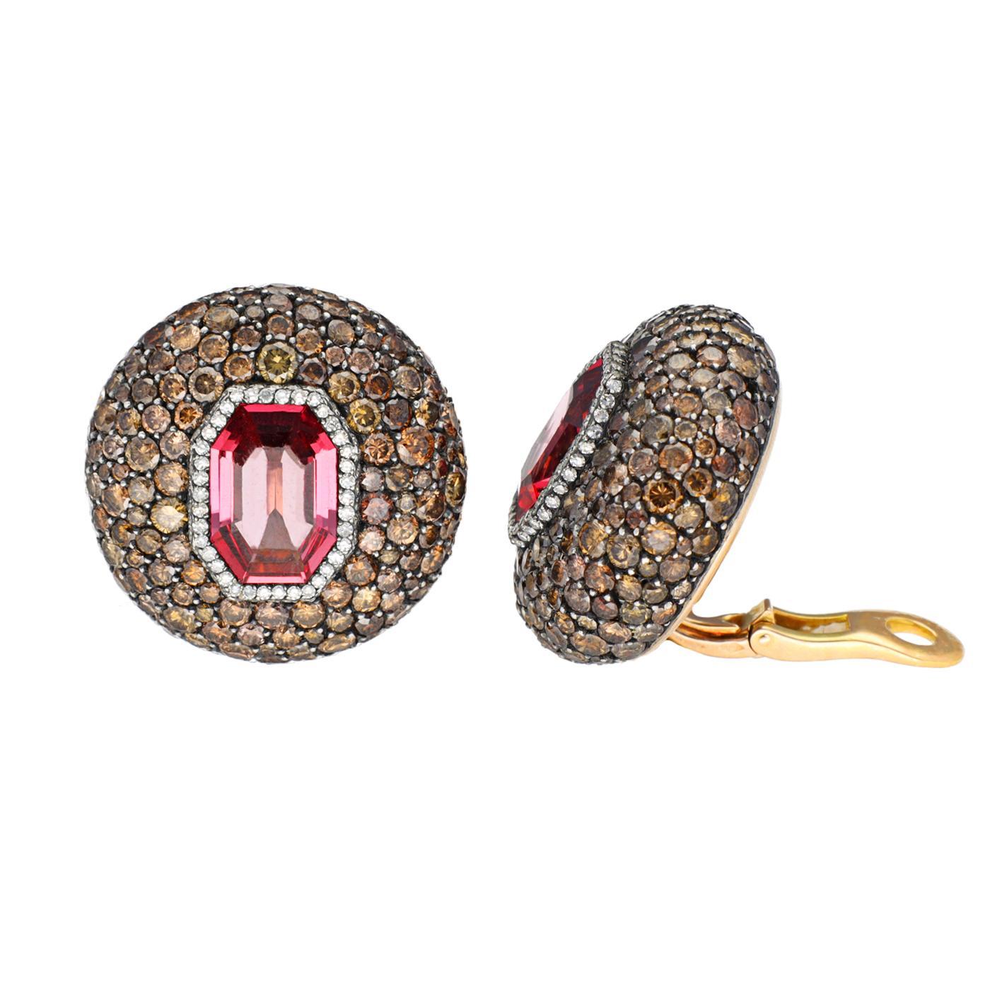 Earclips with octagonal spinels, colored diamonds, near colorless single cut diamonds, and brown-hued pave-set diamonds.
Circa - 1980's
Approximate Length - 1.12
