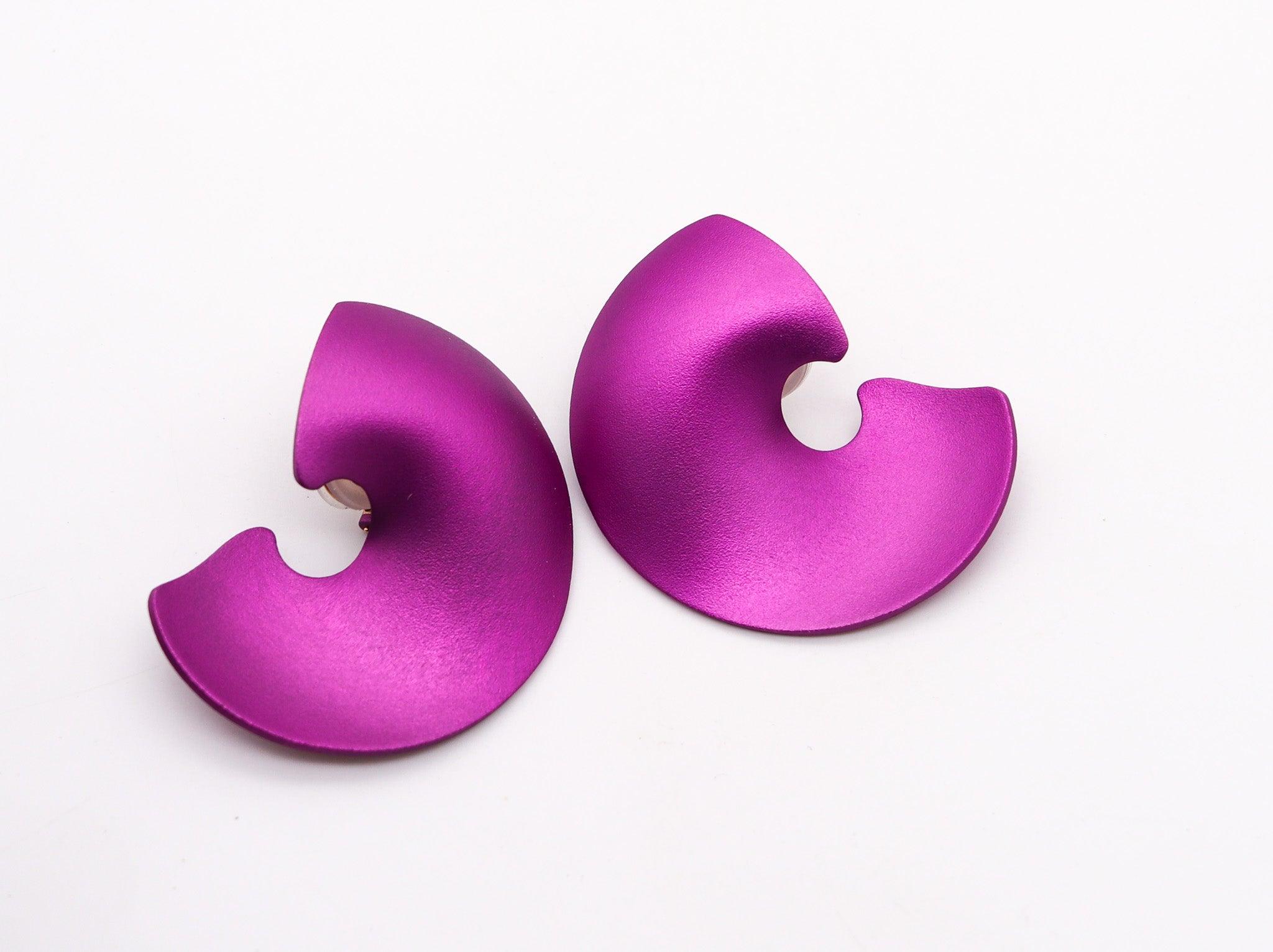 Pair of clips-on earrings designed by JAR Paris.

These are a splendid pair of clips-on earrings, created in Paris France by the iconic luxury jewelry designer Joel Arthur Rosenthal known as JAR Paris. The fabulous earring has been crafted in purple
